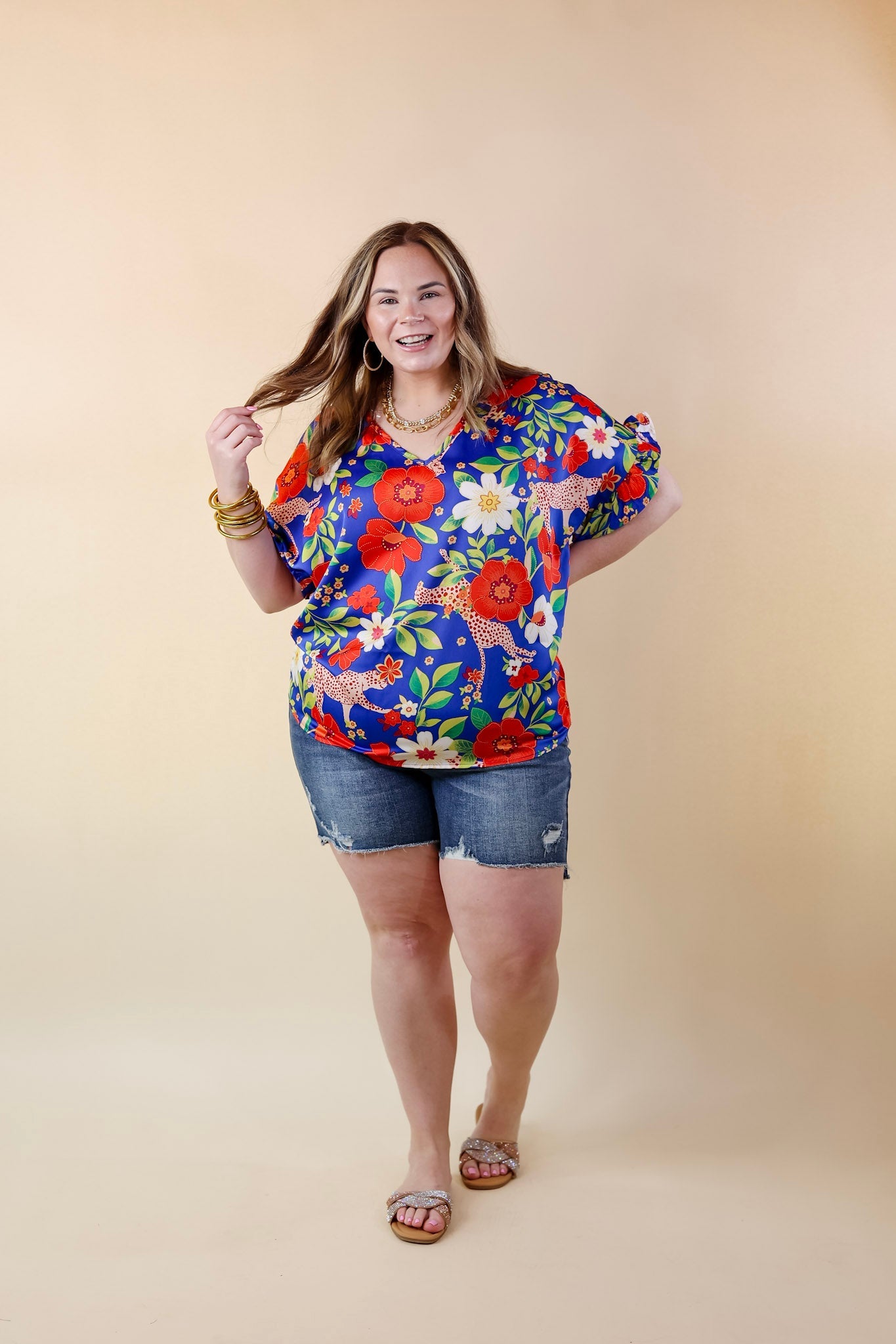 Best Version Floral and Cheetah Print V Neck Top with Ruffle Short Sleeves in Blue - Giddy Up Glamour Boutique