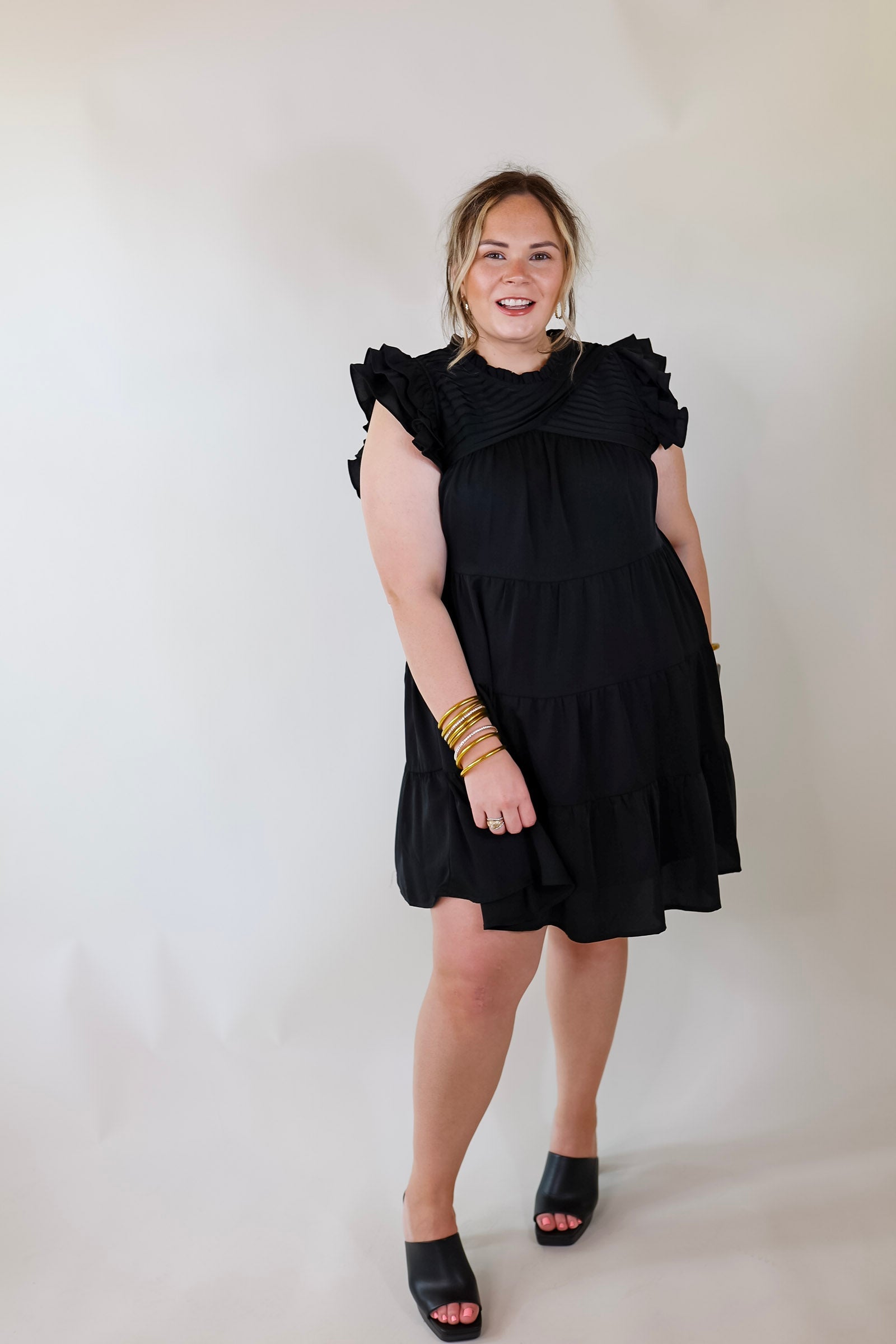 Chic On Scene Ruffle Tiered Dress with Pleated Detailing in Black - Giddy Up Glamour Boutique
