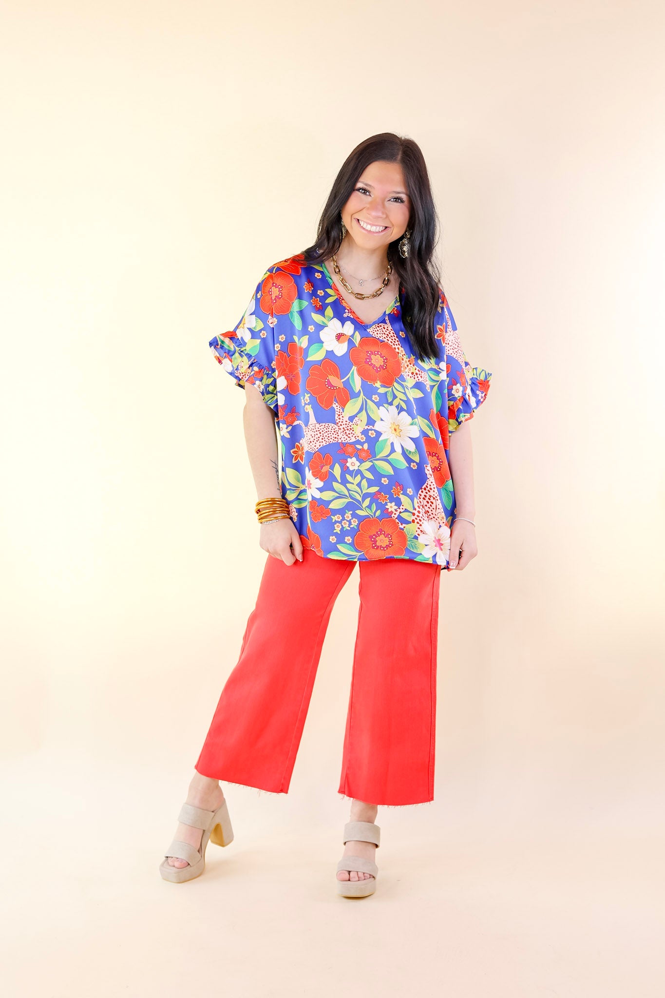 Best Version Floral and Cheetah Print V Neck Top with Ruffle Short Sleeves in Blue