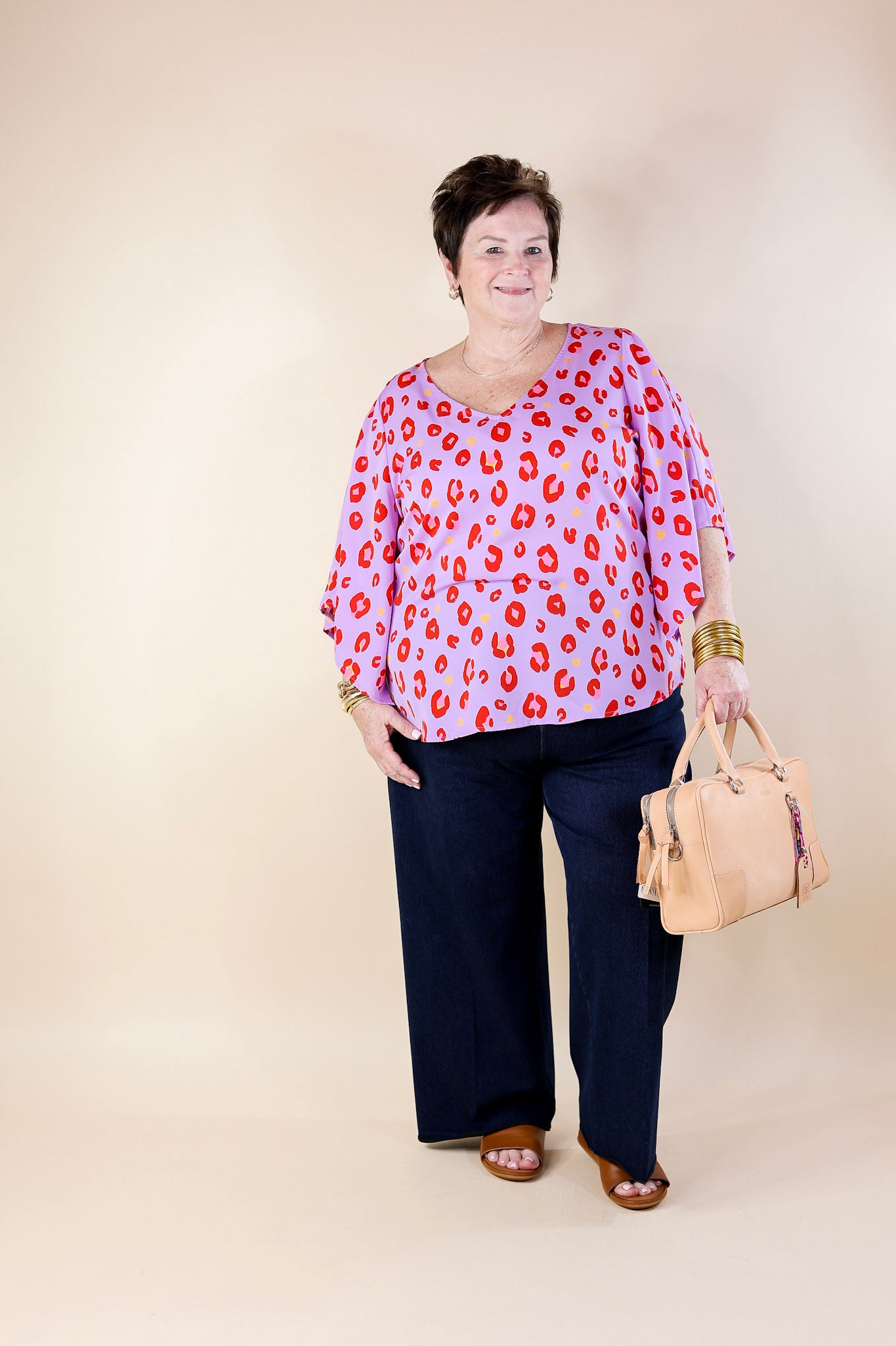Radiant Glow V Neck Leopard Print Top with Flowy Sleeves in Purple - Giddy Up Glamour Boutique