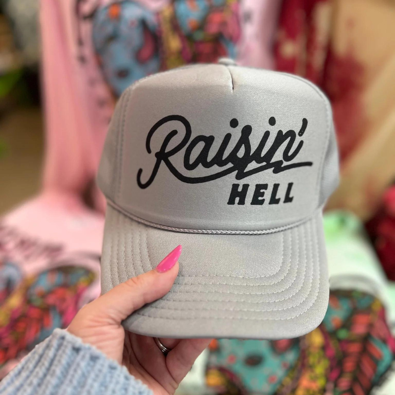 Online Exclusive | Raisin' Hell Foam Trucker Cap in Gray - Giddy Up Glamour Boutique