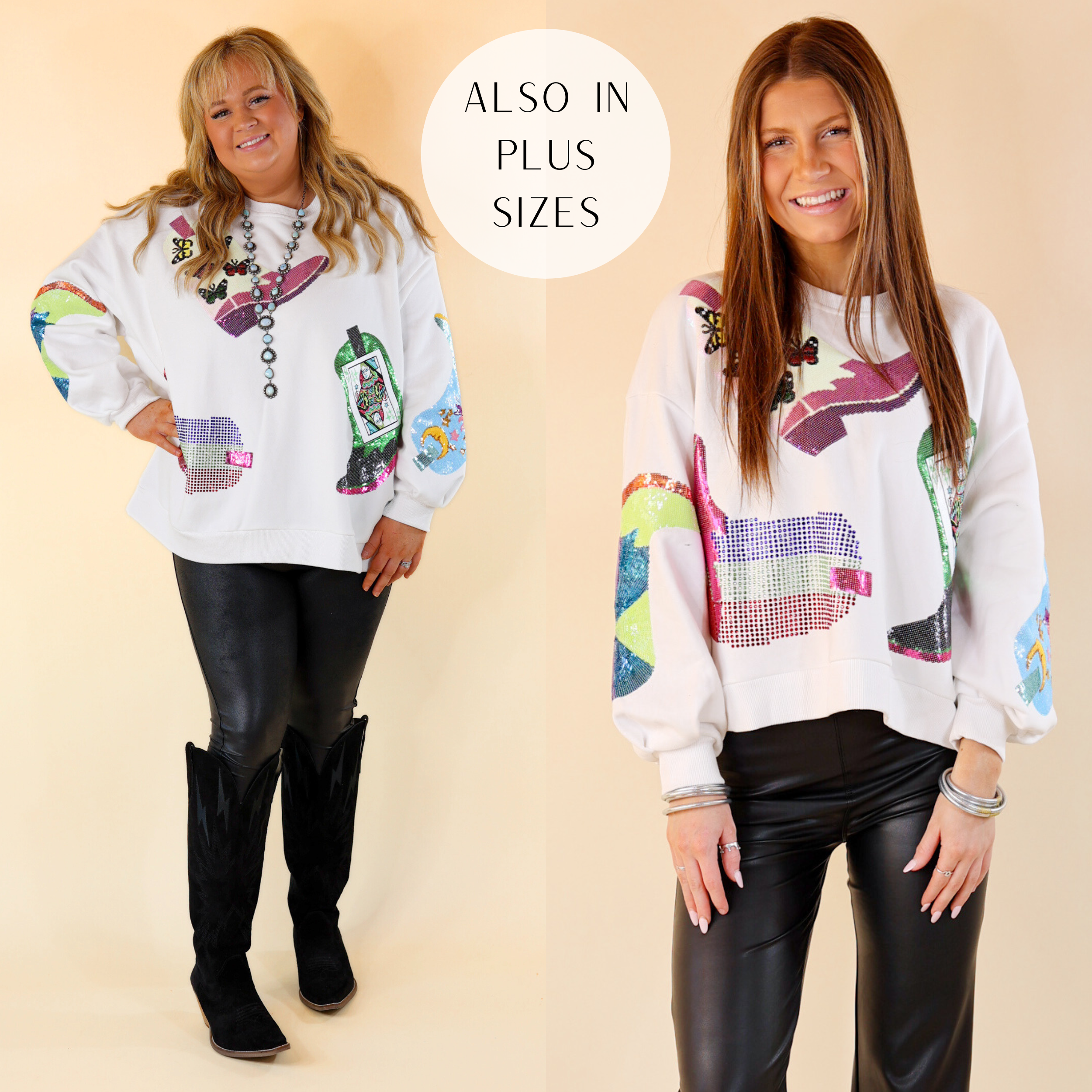 Models are wearing a white long sleeve sweatshirt with multicolor boot icons. Size plus has it paired with black pants with black Dingo boots. Size small has it paired with silver jewelry and black pants. 