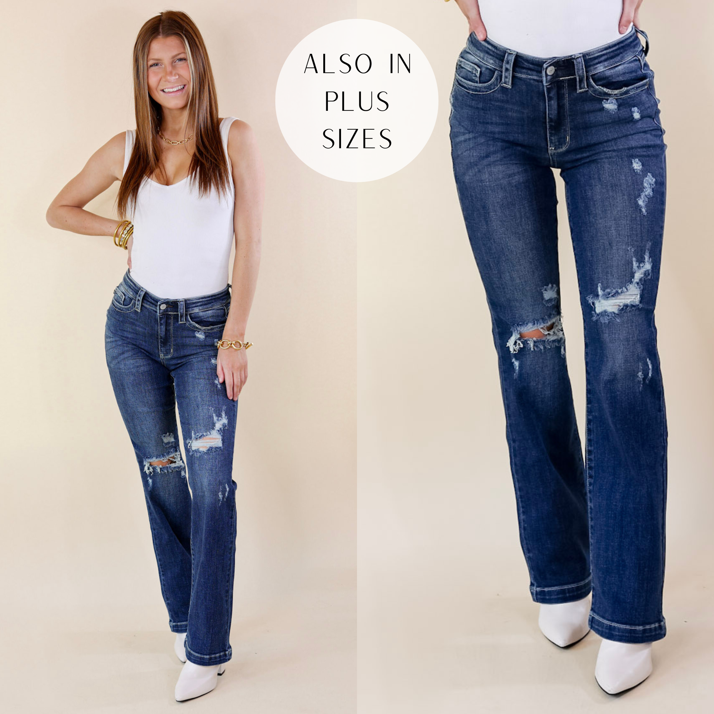  Model is wearing a pair of distressed bootcut jeans. Model has it paired with a white tank top,  white booties, and gold jewelry.