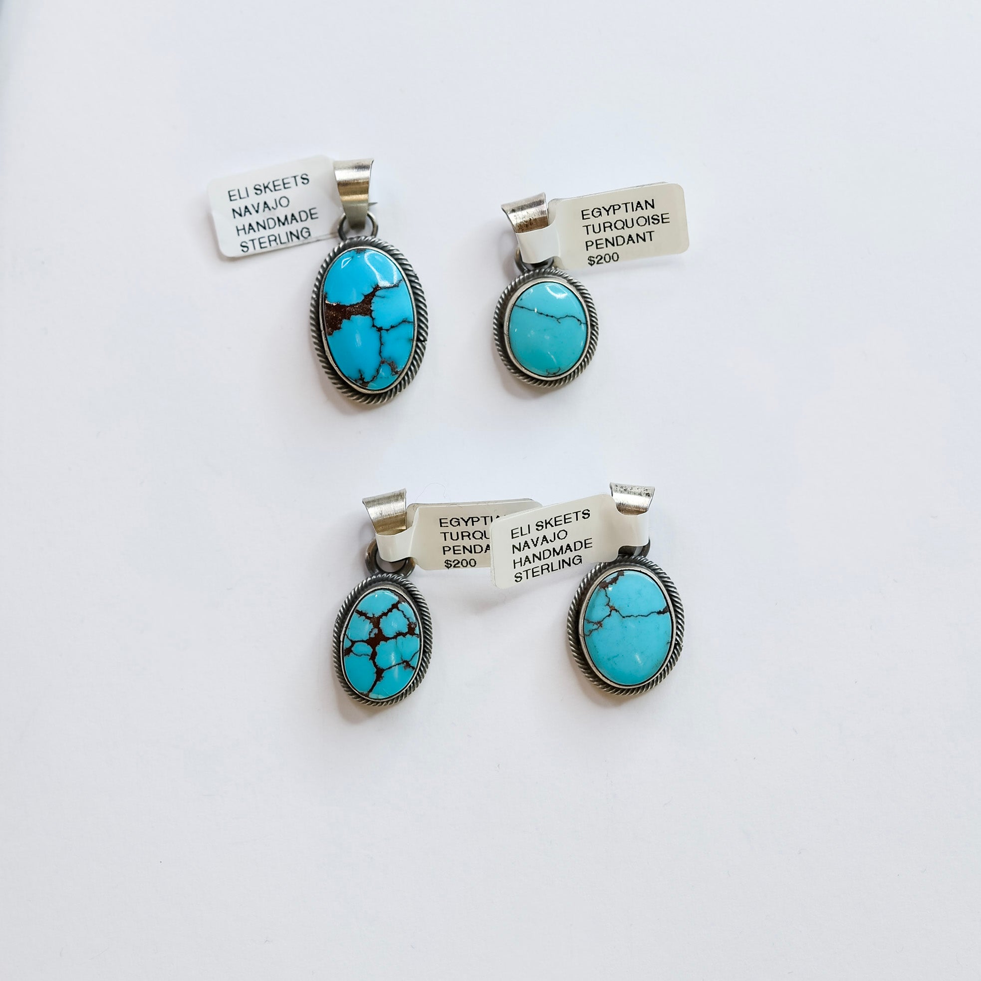 Skeets good Navajo Petroglyph sterling pendant with turquoise