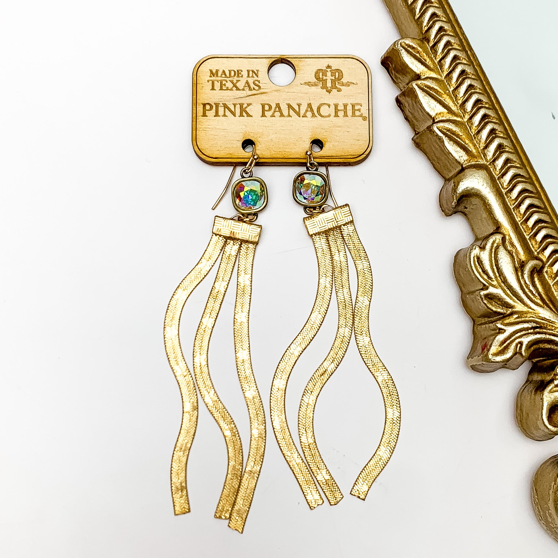 Pink Panache | AB Cushion Cut Crystal Drop Earrings with Star Embossed Gold Tone Tassels - Giddy Up Glamour Boutique