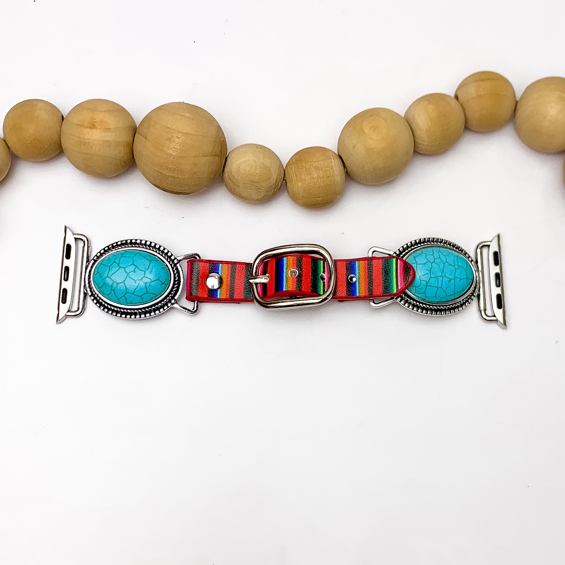 Turquoise Oval Stone Watch Band With Colorful Stripes. Pictured on a white background with wood beads above the band. 