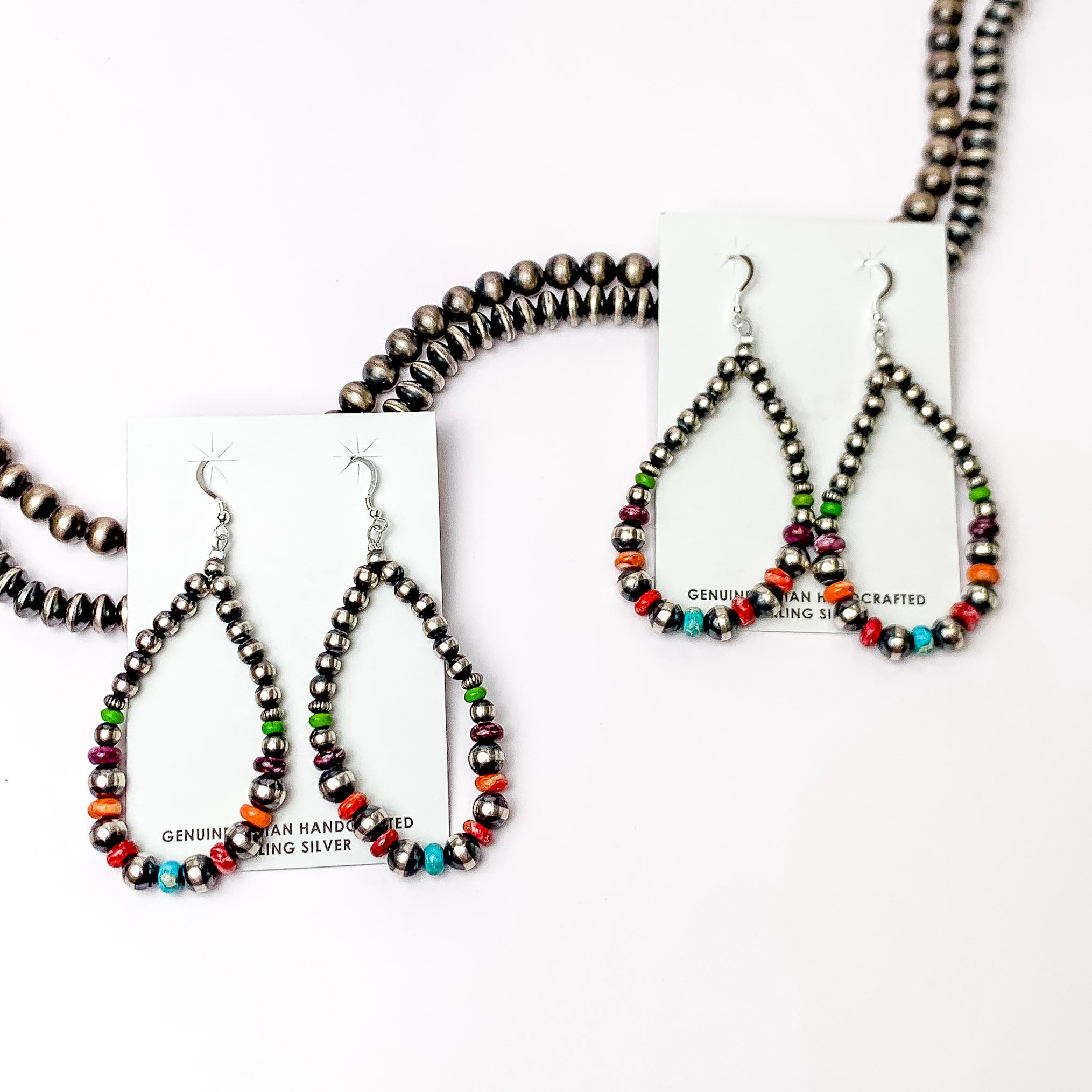 Navajo | Navajo Handmade Sterling Silver Navajo Pearl Teardrop Earrings with Green, Blue, Purple, and Orange Spacers - Giddy Up Glamour Boutique