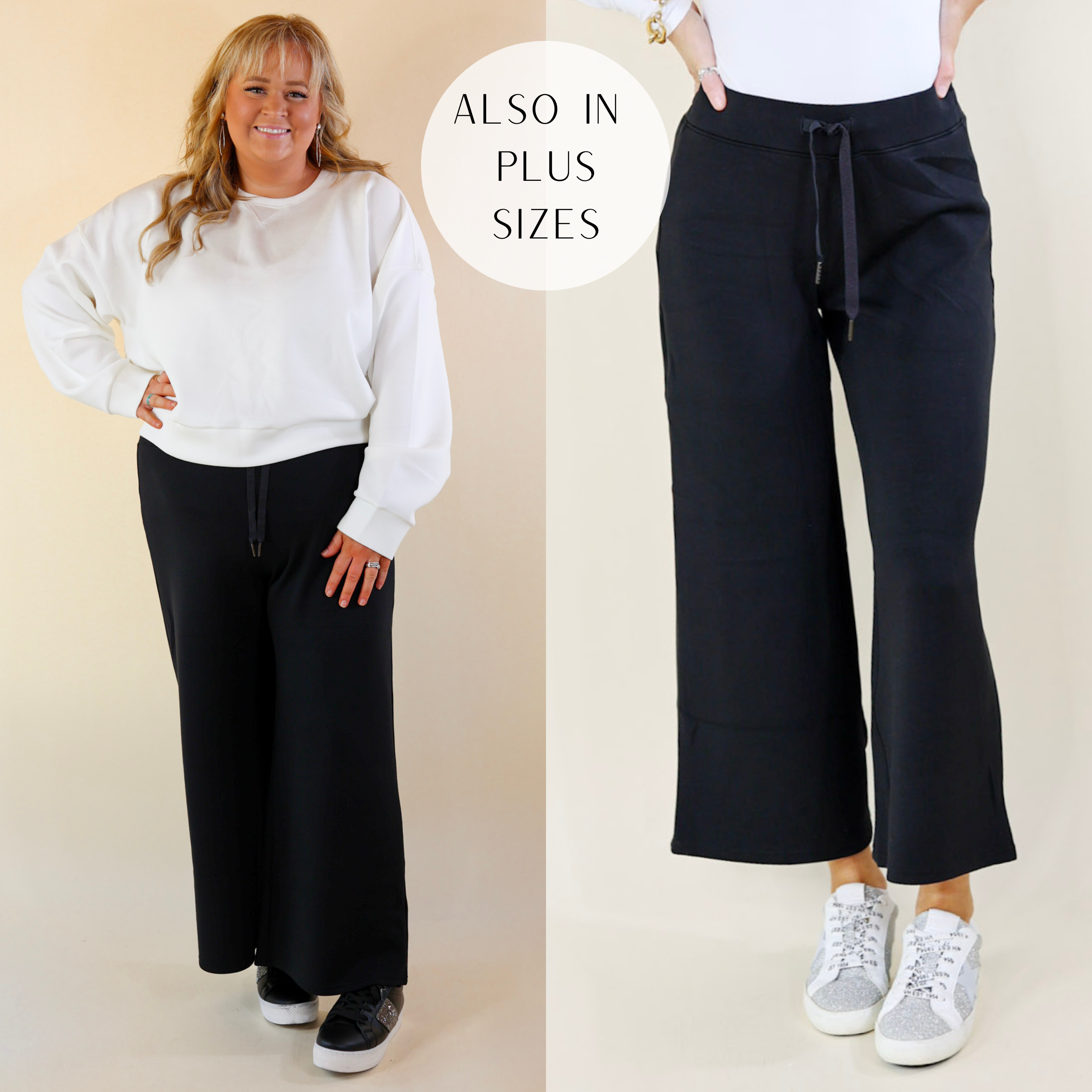 Models are wearing a pair of cropped wide leg sweatpants in black. Both models have it paired with a white top and sneakers.