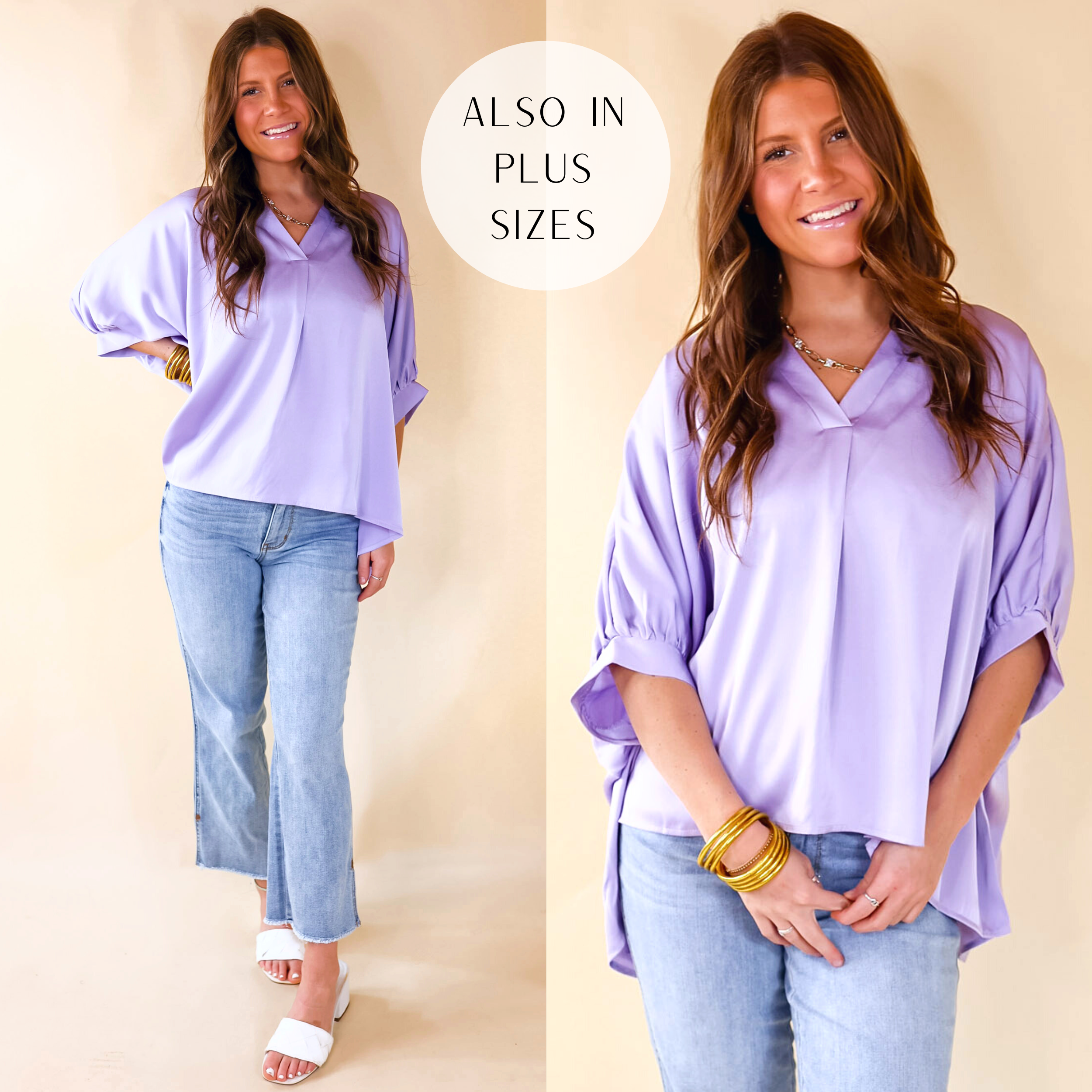 A lilac colored blouse featuring a light silky fabric, cuffed sleeves, and a V neckline.
