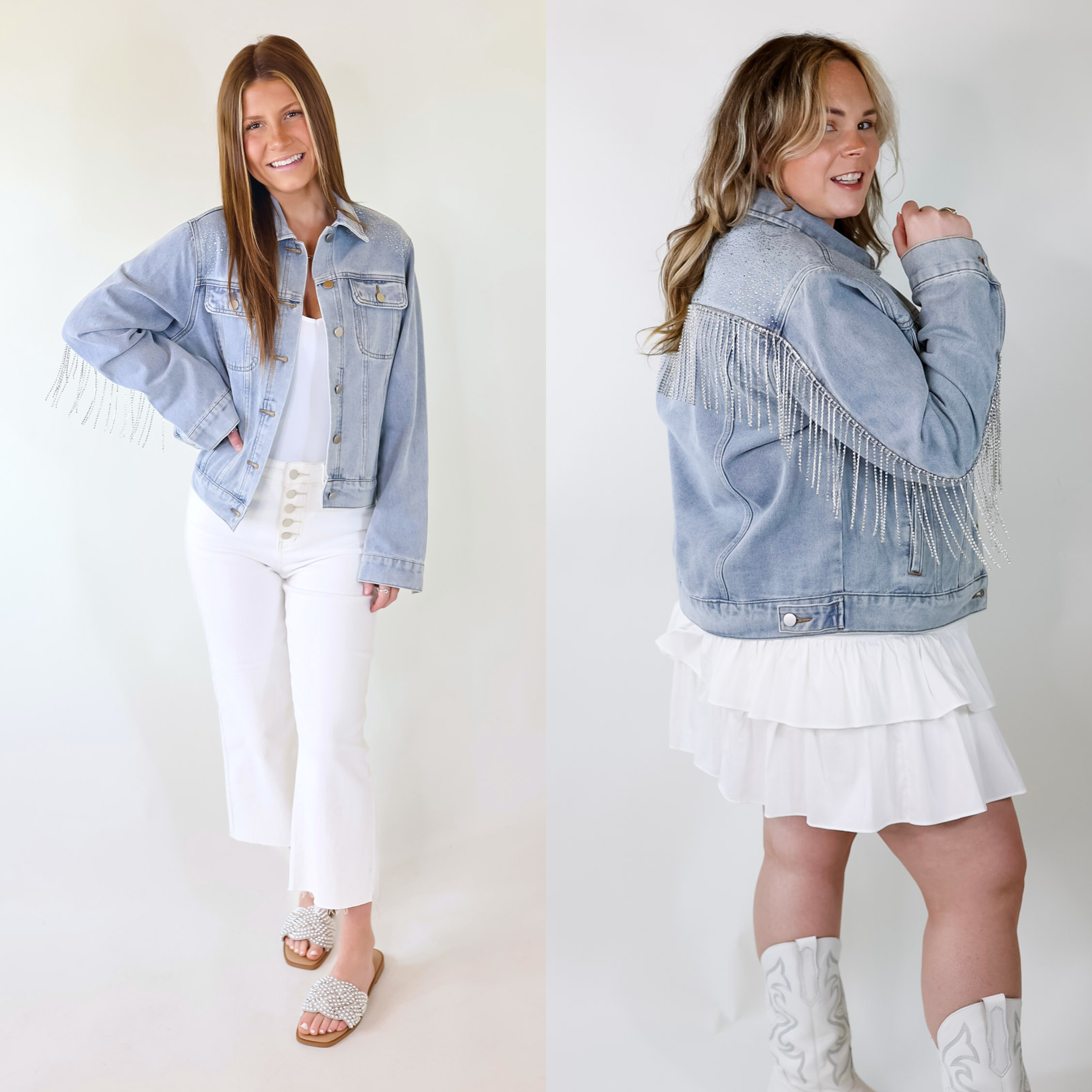Model is wearing a light wash denim jacket featuring crystals near the shoulders, a crystal fringe on the back, pockets, collar, and button up front with a white background.
