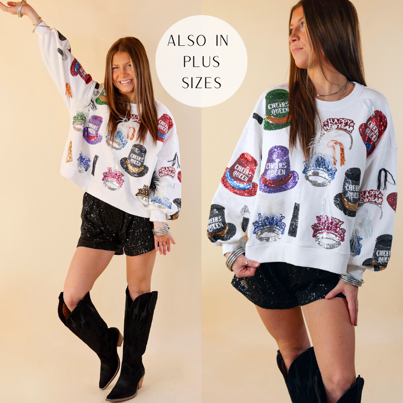Model is wearing a white Queen of Sparkles sweatshirt with sequin New Years Hats paired with black sequin shorts, silver BuDhaGirl bracelets, and black boots.