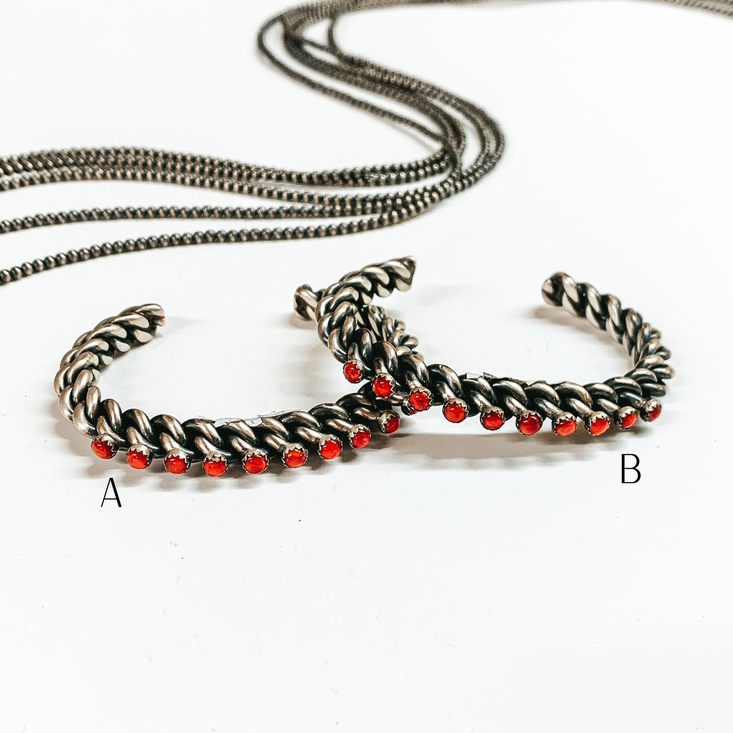 Navajo | Navajo Handmade Sterling Silver Braided Cuff with Ten Small Red Coral Stones - Giddy Up Glamour Boutique