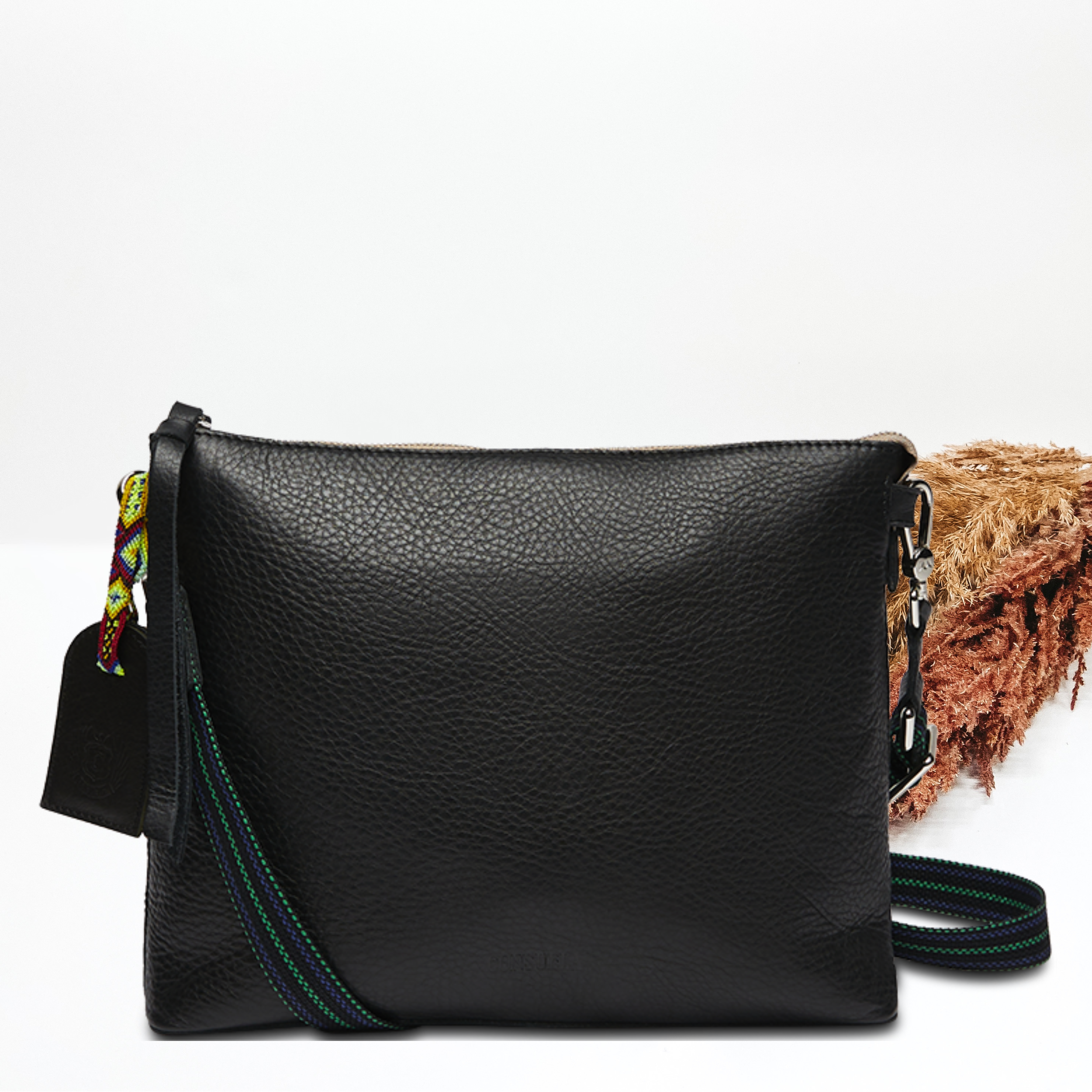 Black, downtown crossbody pictured on a white background. 