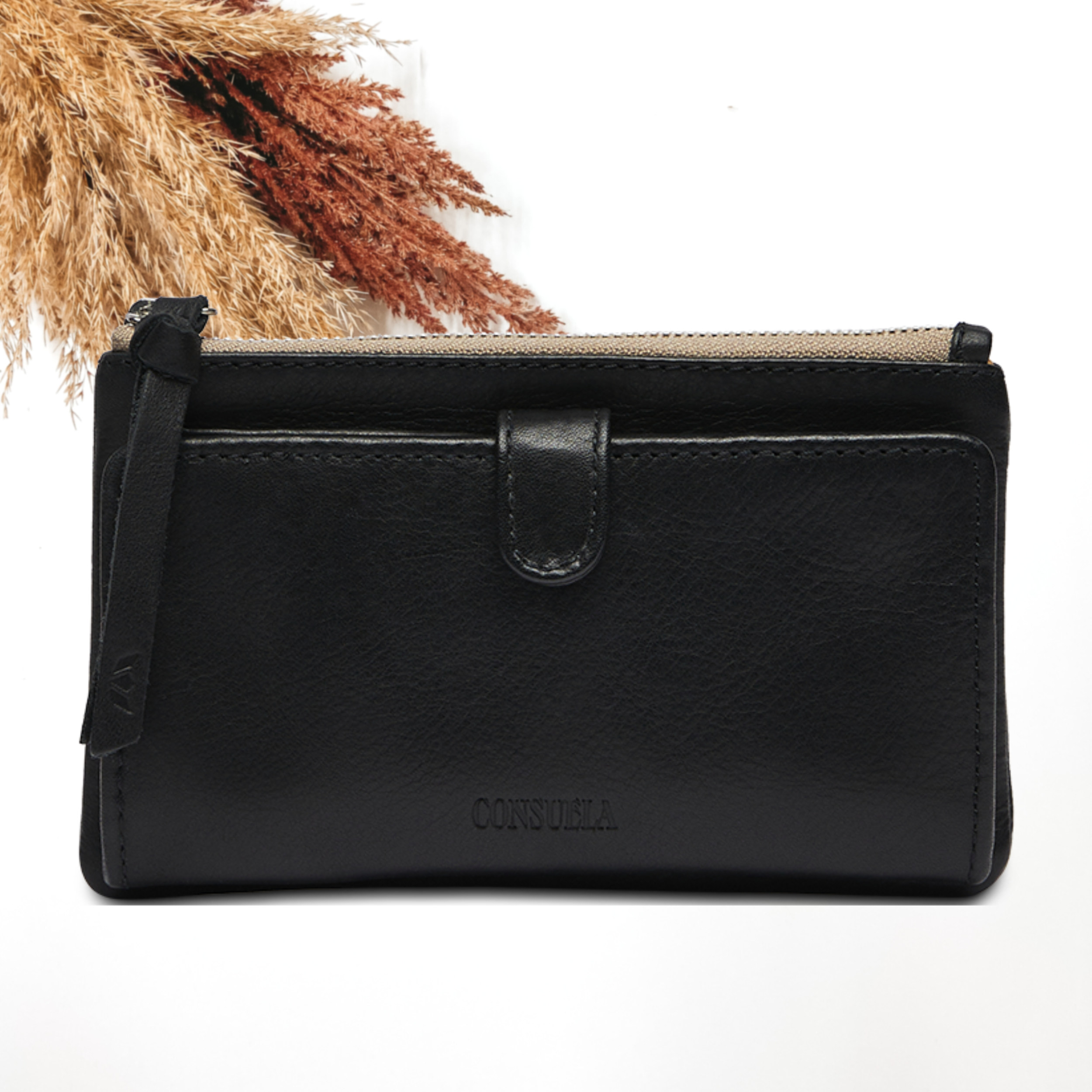 Pictured on a white background is a black slim wallet with a black zipper pull. 