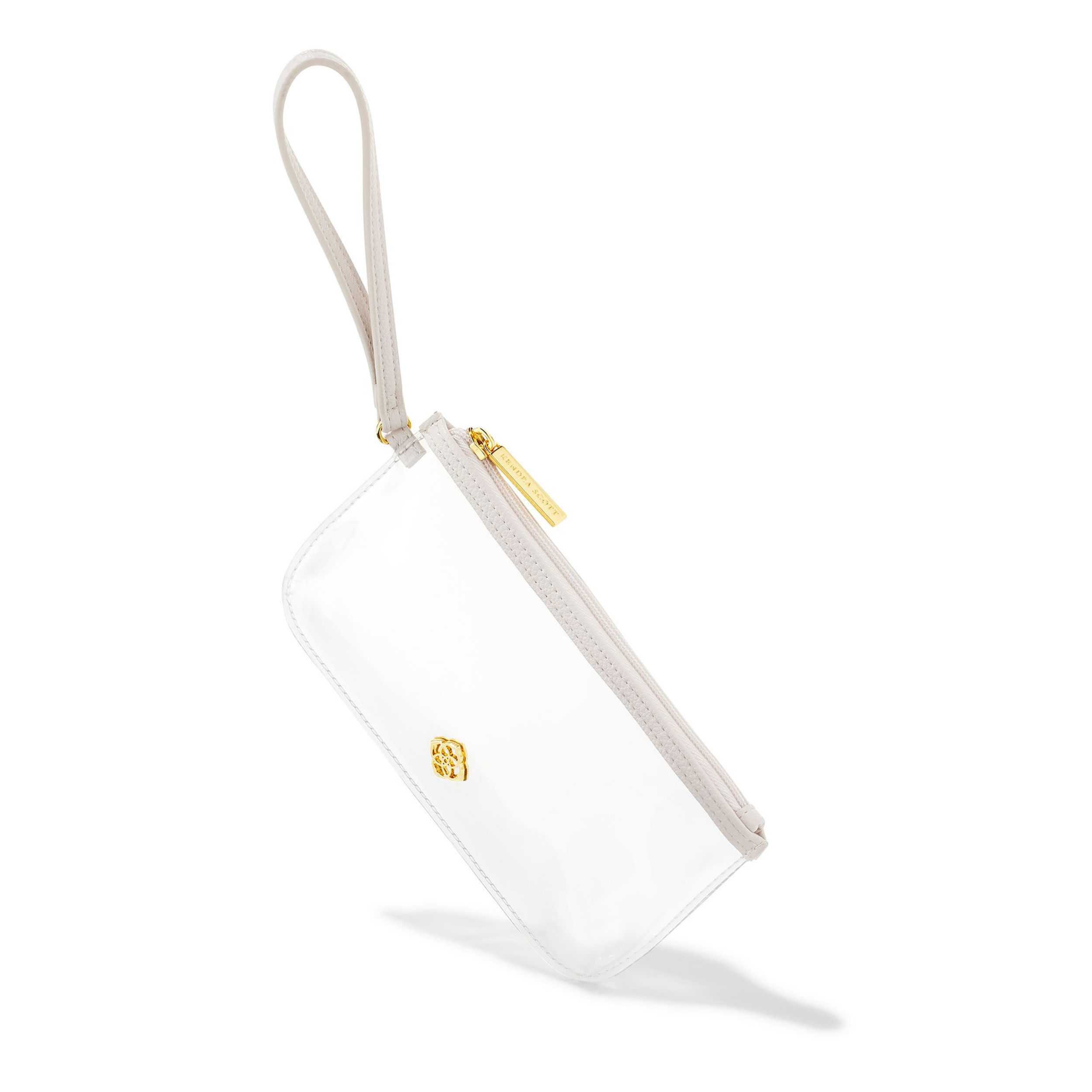 Pictured on a white background is a clear Kendra Scott clear wristlet.