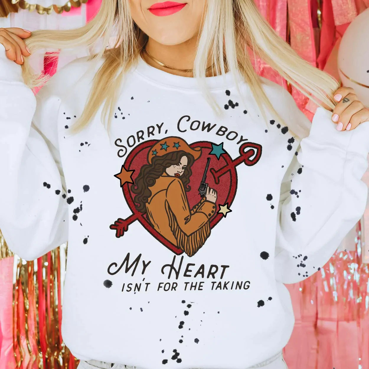 Online Exclusive | Sorry, Cowboy Long Sleeve Graphic Sweatshirt with Black Splatter Paint in White - Giddy Up Glamour Boutique