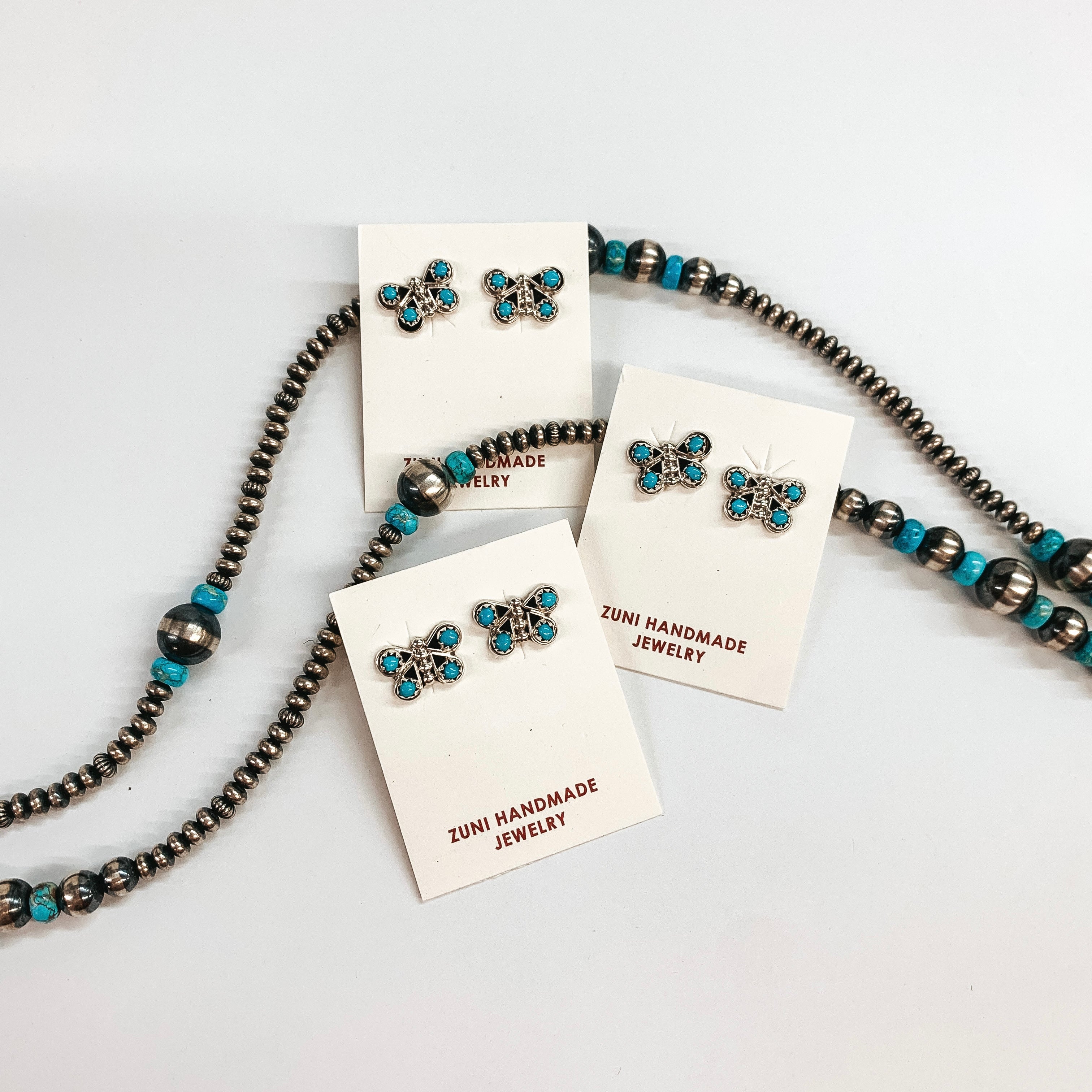 Zuni | Zuni Handmade Genuine Sterling Butterfly Earrings with Small Turquoise Stones - Giddy Up Glamour Boutique