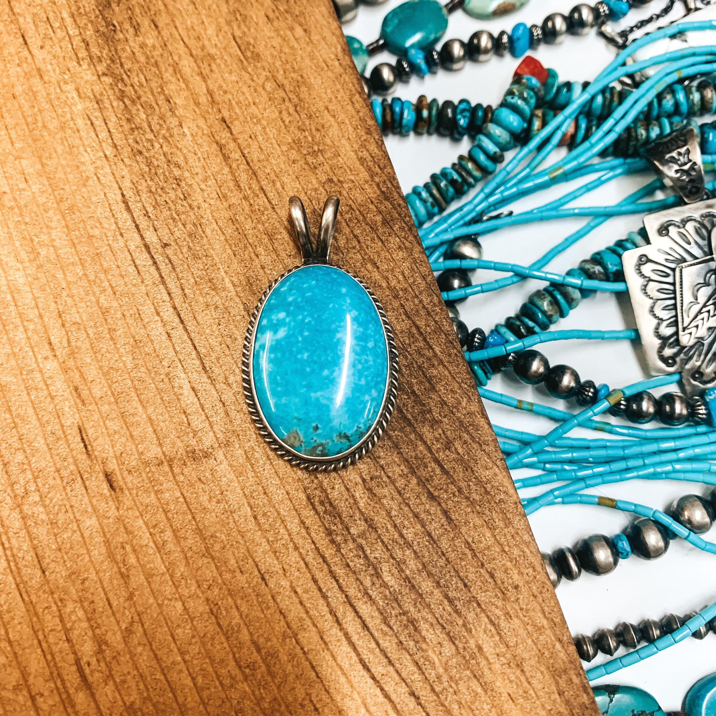 Dave Skeets  | Navajo Handmade Sterling Silver Oval Pendant with Kingman Turquoise Stone - Giddy Up Glamour Boutique