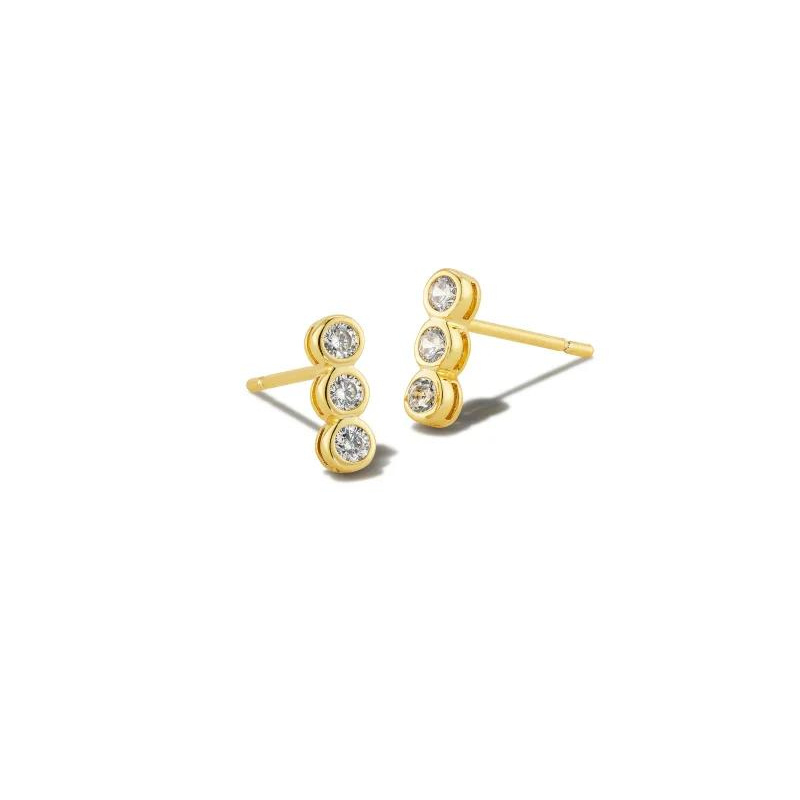 Gold stud earrings with 3 white crystals, pictured on a white background.