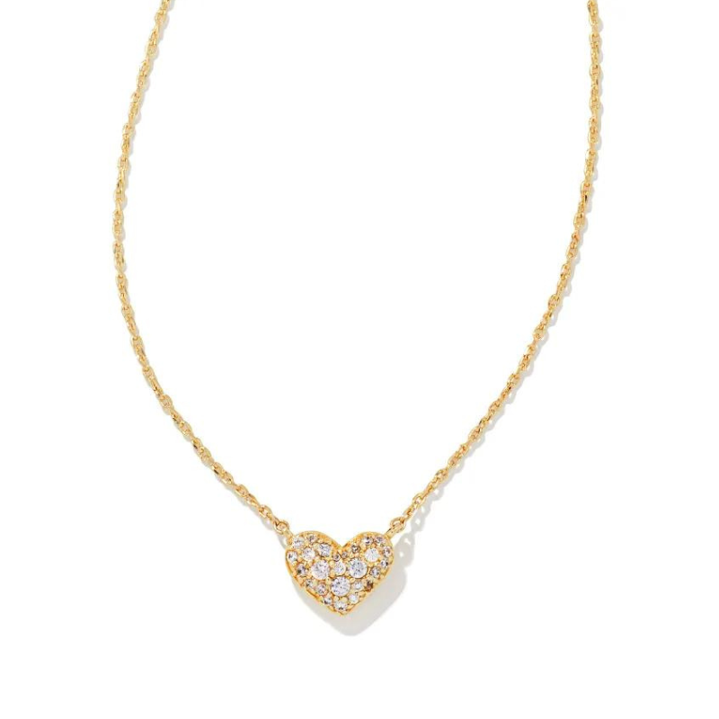 Gold crystal heart necklace, pictured on a white background.