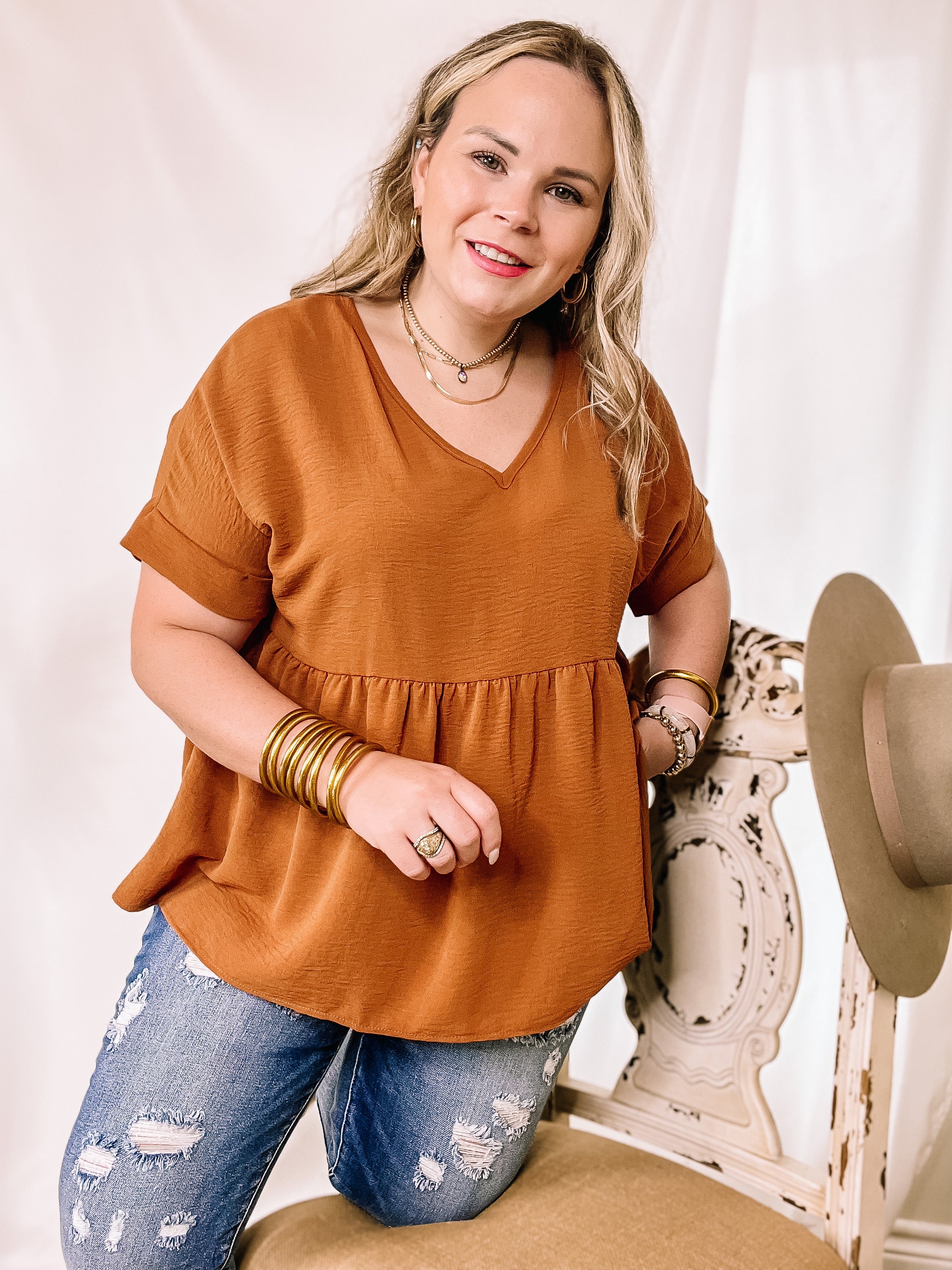 Touring the City Short Sleeve V Neck Babydoll Top in Rust Orange - Giddy Up Glamour Boutique