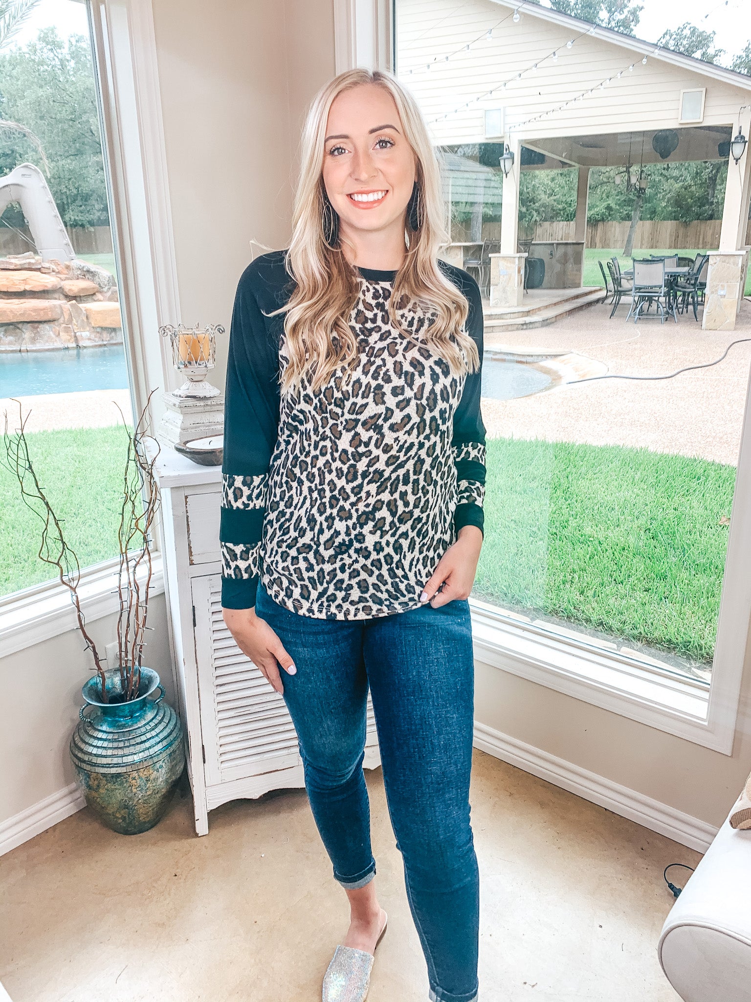Earning Your Spots Leopard Long Sleeve Top with Color Block Sleeves in Black - Giddy Up Glamour Boutique