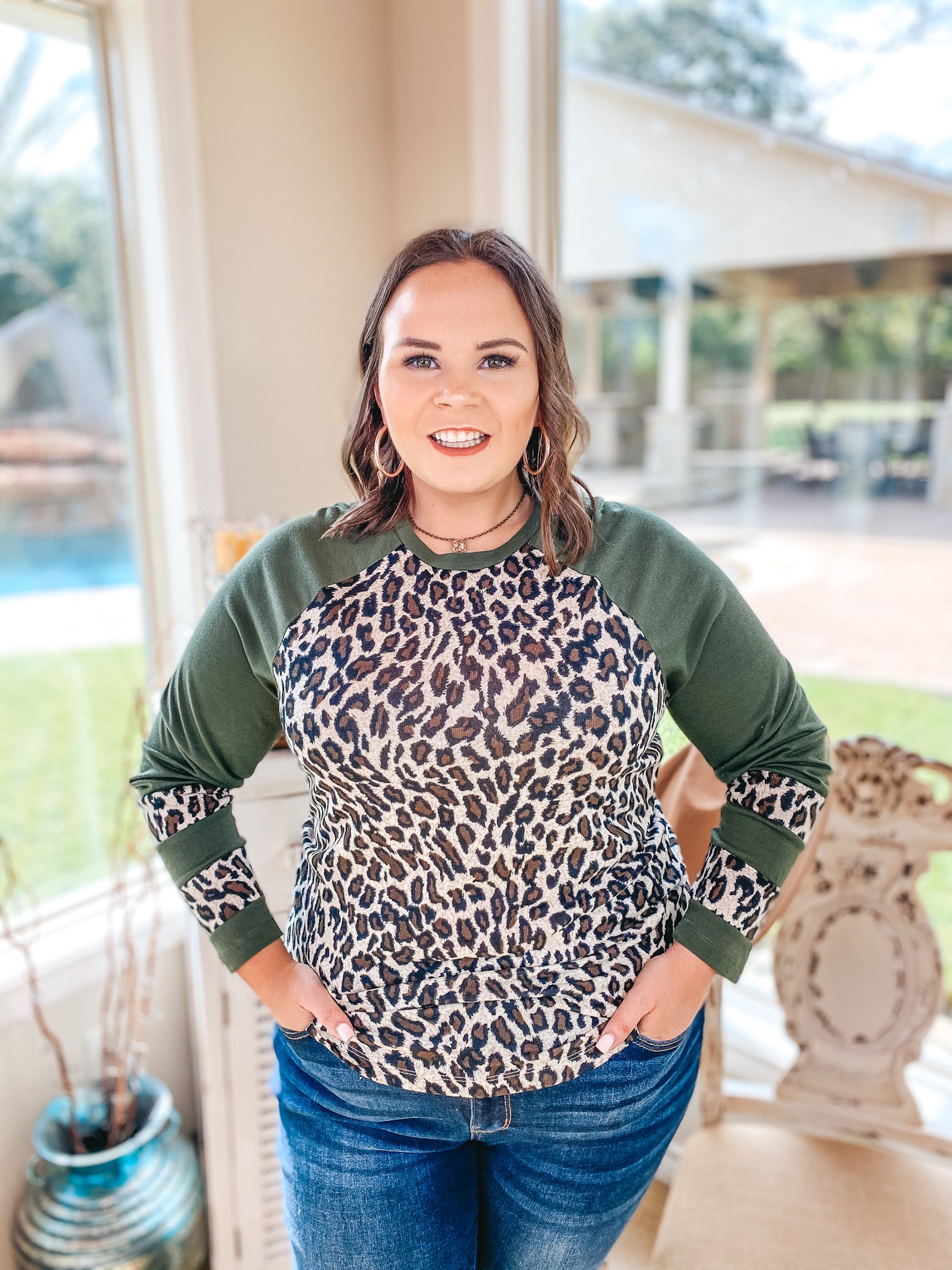 Earning Your Spots Leopard Long Sleeve Top with Color Block Sleeves in Olive Green - Giddy Up Glamour Boutique