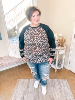 Earning Your Spots Leopard Long Sleeve Top with Color Block Sleeves in Black - Giddy Up Glamour Boutique