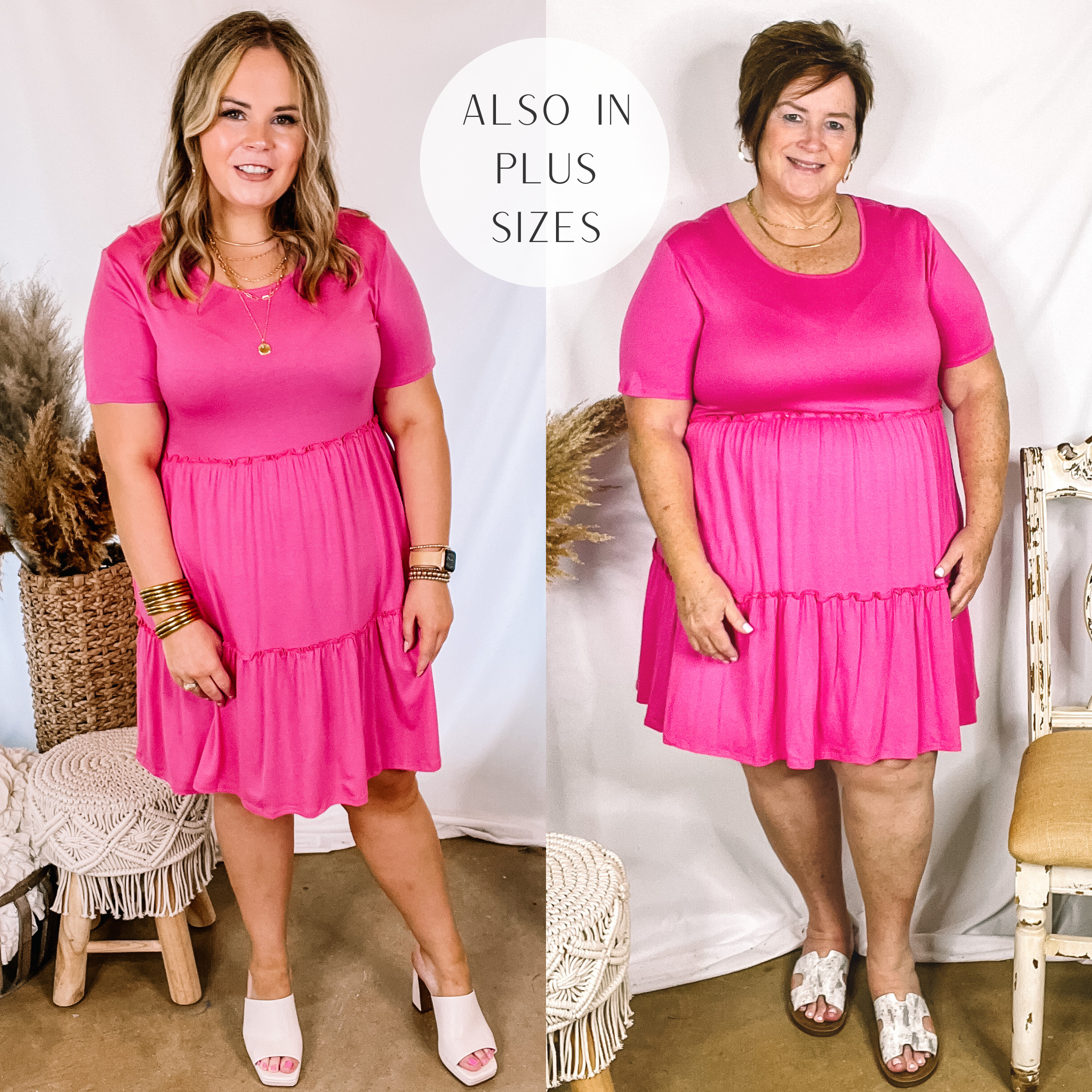 Models are wearing a pink tiered dress with short sleeves. Size large model has it paired with white heels and gold jewelry. Plus size model has it paired with white sandals and gold jewelry.