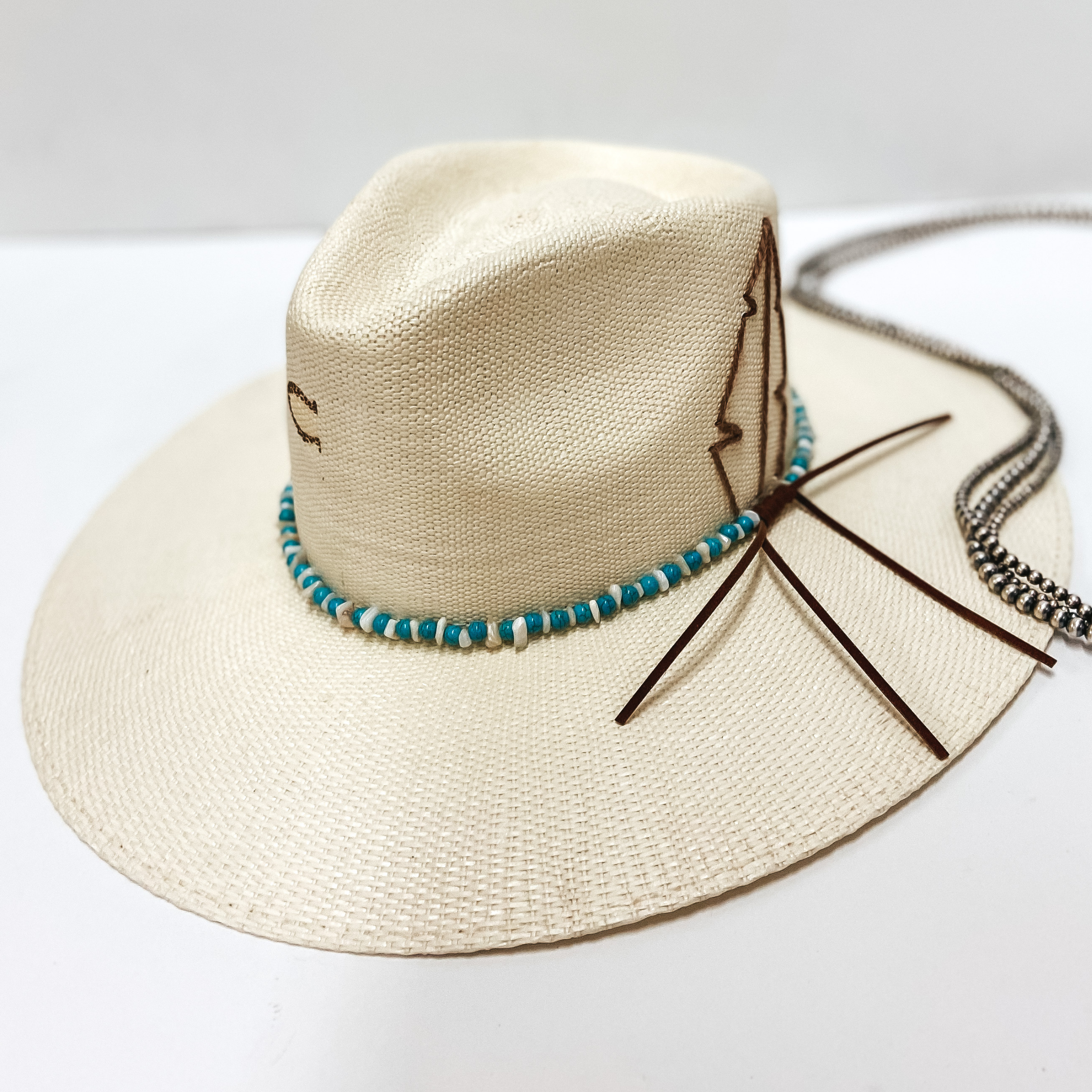 Charlie 1 Horse | Midnight Toker Straw Stiff Brim Hat with Embroidered Feather and Beaded Band in Natural - Giddy Up Glamour Boutique