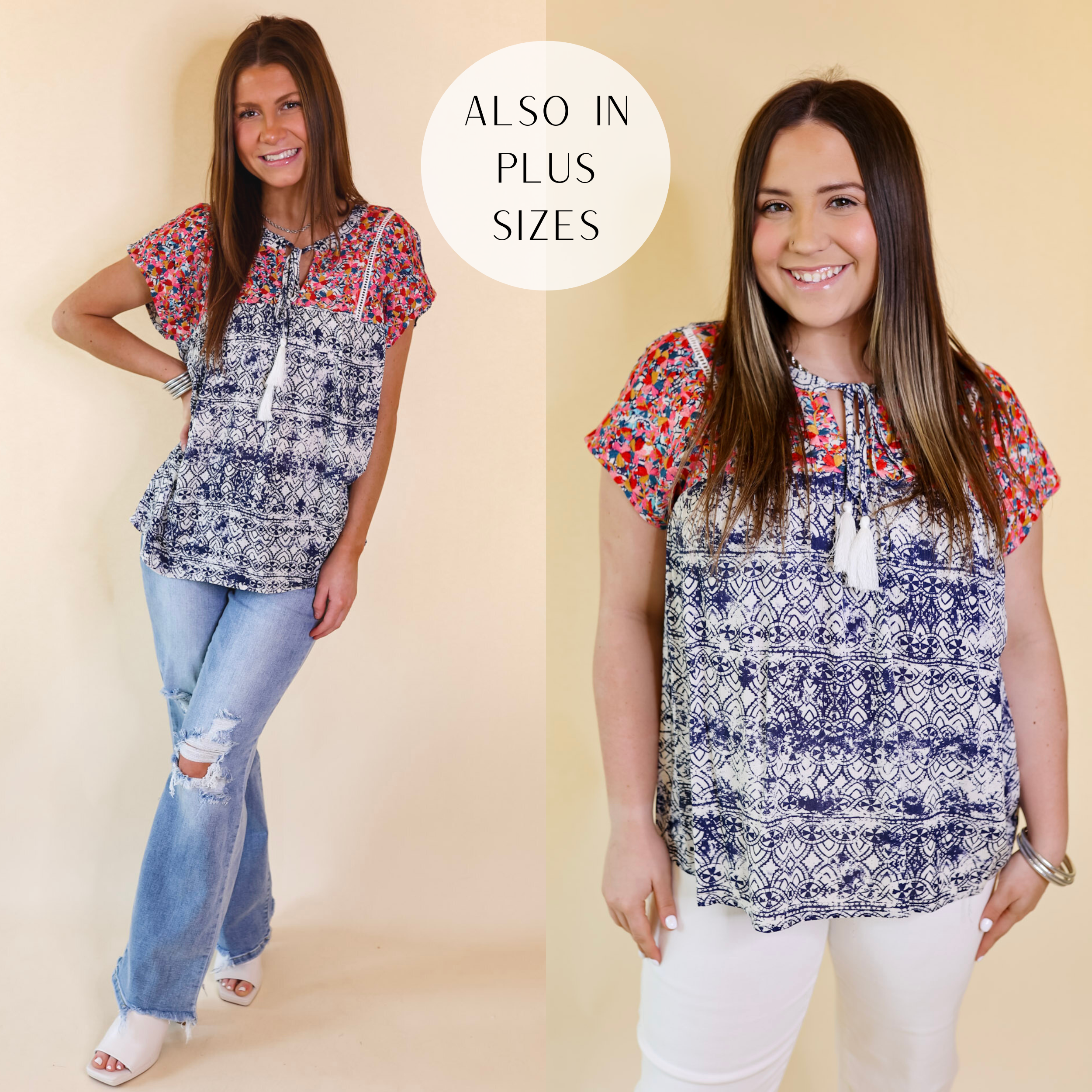 Models are wearing a navy blue and ivory print top with colorful embroidery and a keyhole at the front. Size small model has it paired with distressed light wash jeans, white heels, and silver jewelry. Size large model has it paired with white jeans and silver jewelry.