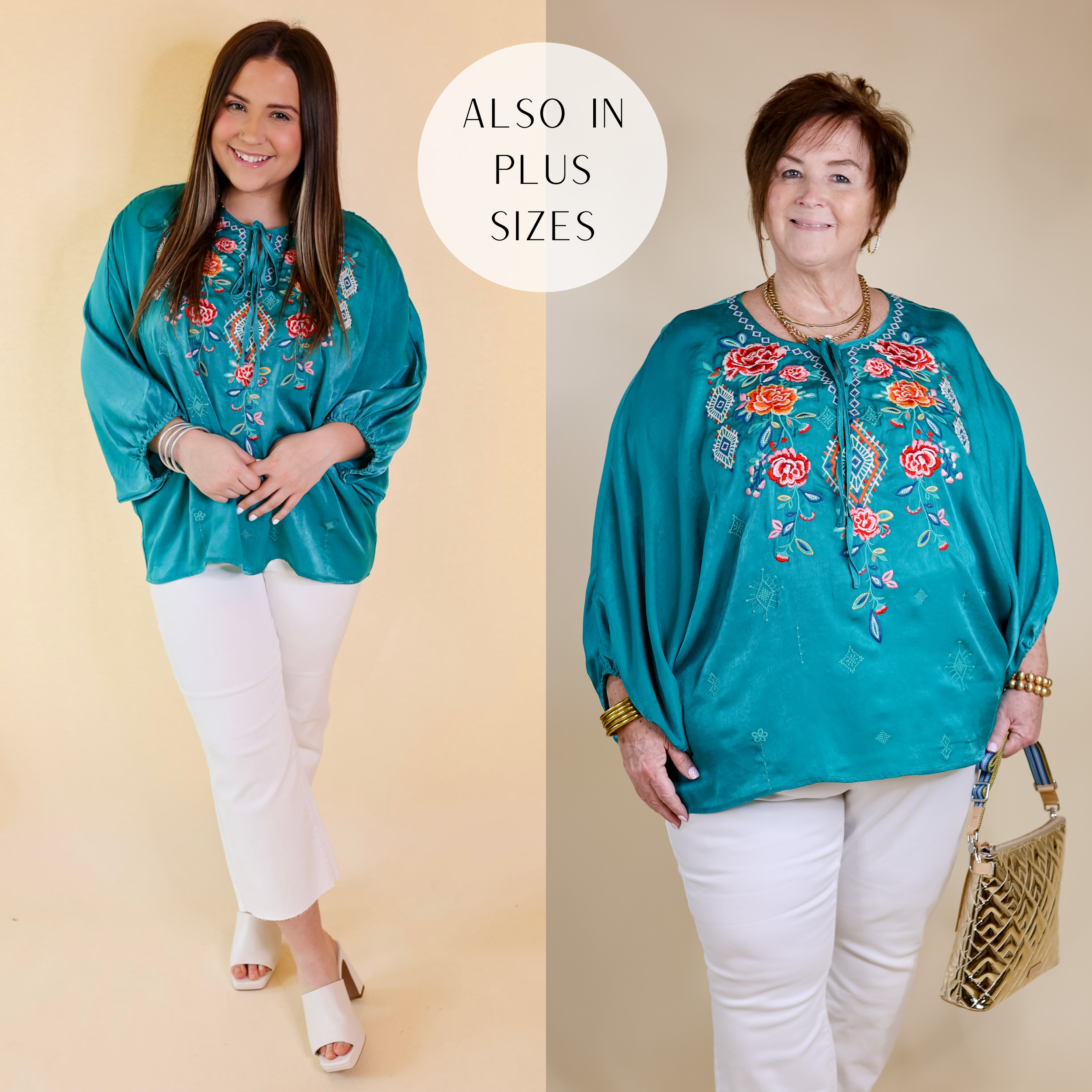 Model is wearing a teal poncho top with colorful floral embroidery, a front keyhole, and a poncho style body. Model has this top paired with white jeans, white heels, and silver jewelry.