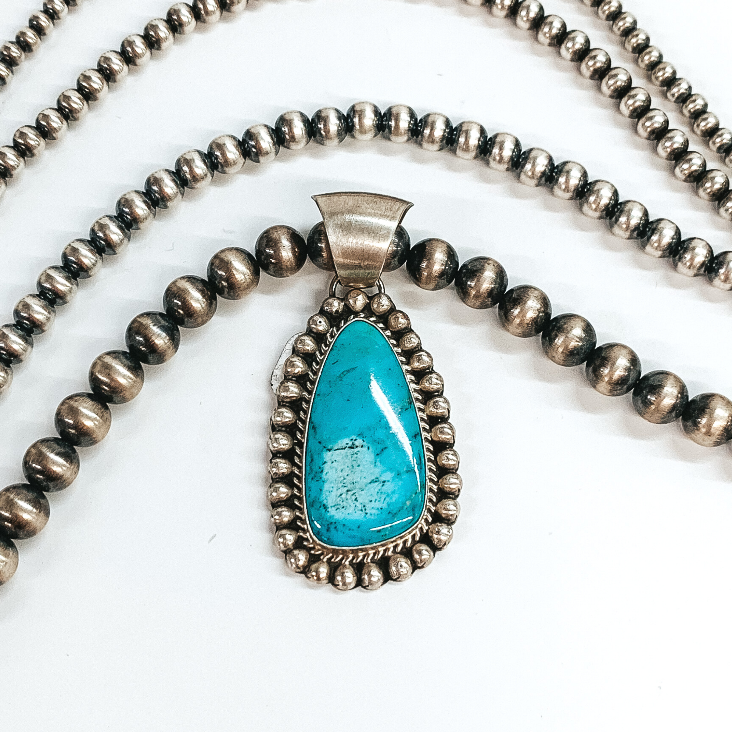 Augustine Largo | Navajo Handmade Sterling Silver Asymmetrical Pendant with Kingman Turquoise Stone - Giddy Up Glamour Boutique