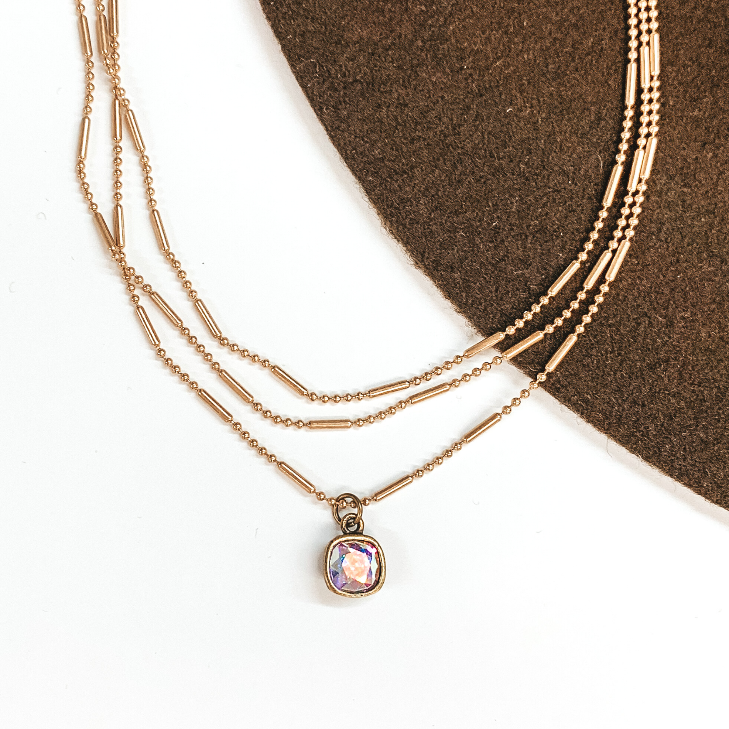 Pink Panache | Three Strand Gold Dot and Bar Chain Necklace with AB Cushion Cut Crystal Drop - Giddy Up Glamour Boutique