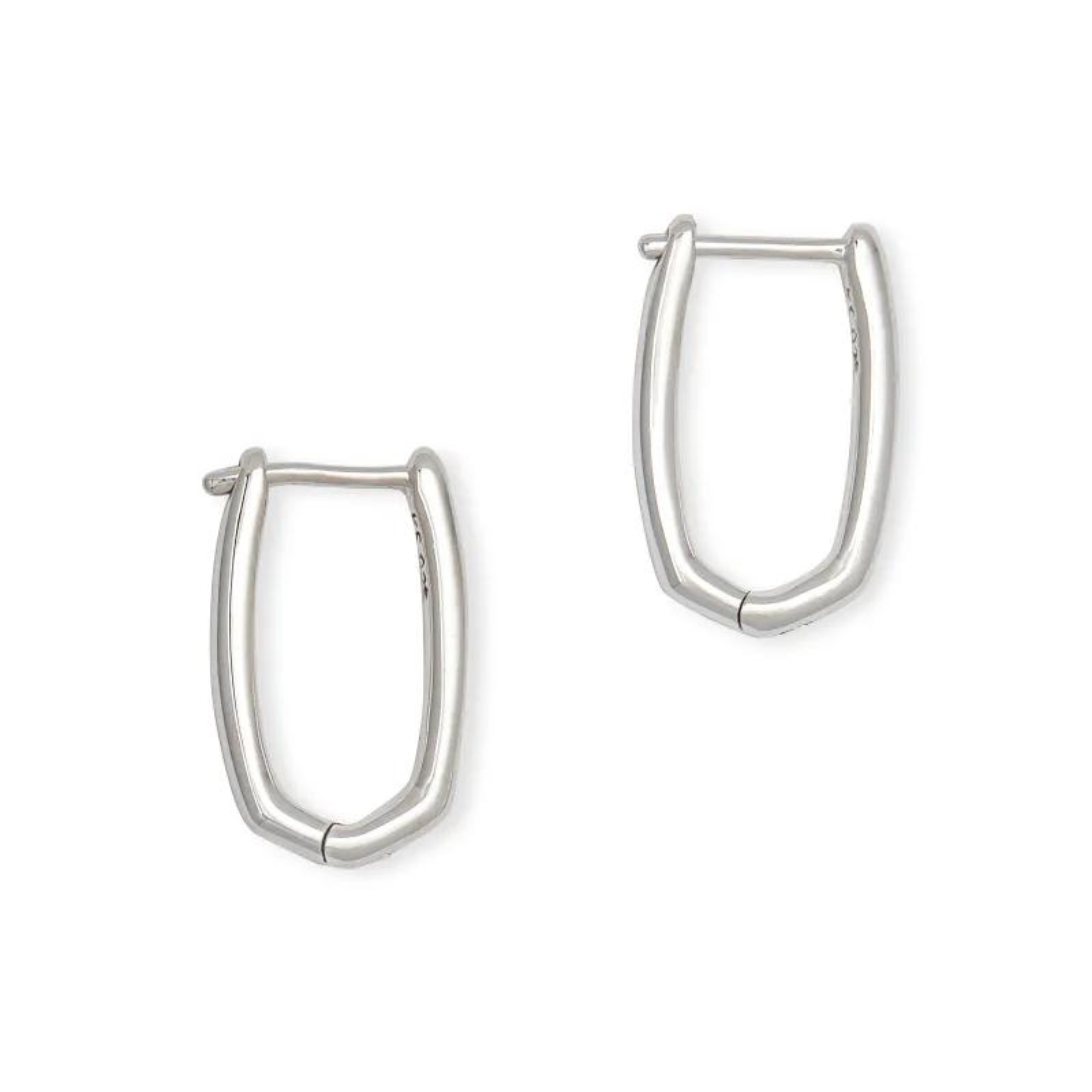 Thin, silver hoop earrings pictured on a white background. 