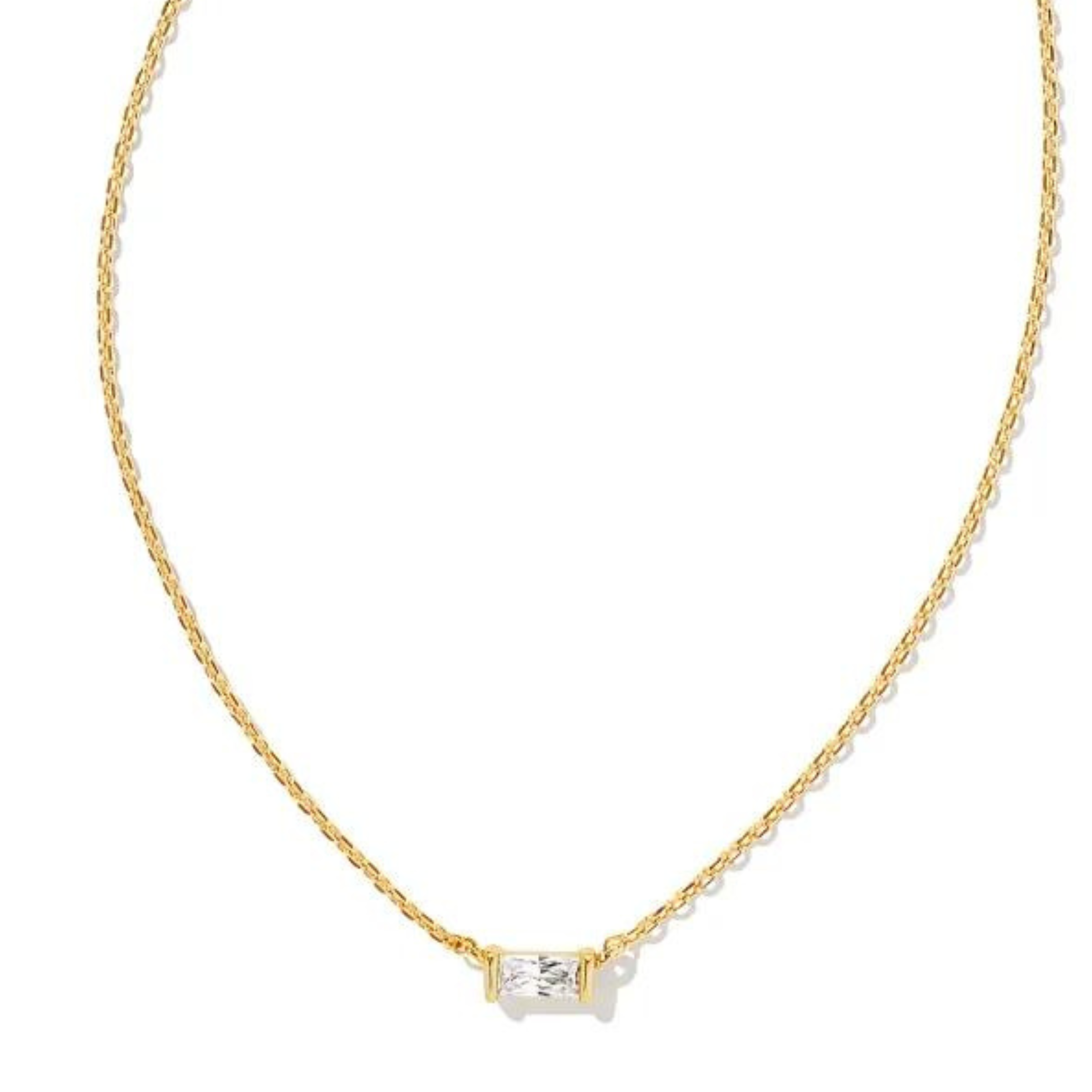 Gold chain necklace with a rectangle, clear crystal pendant. This necklace is pictured on a white background. 