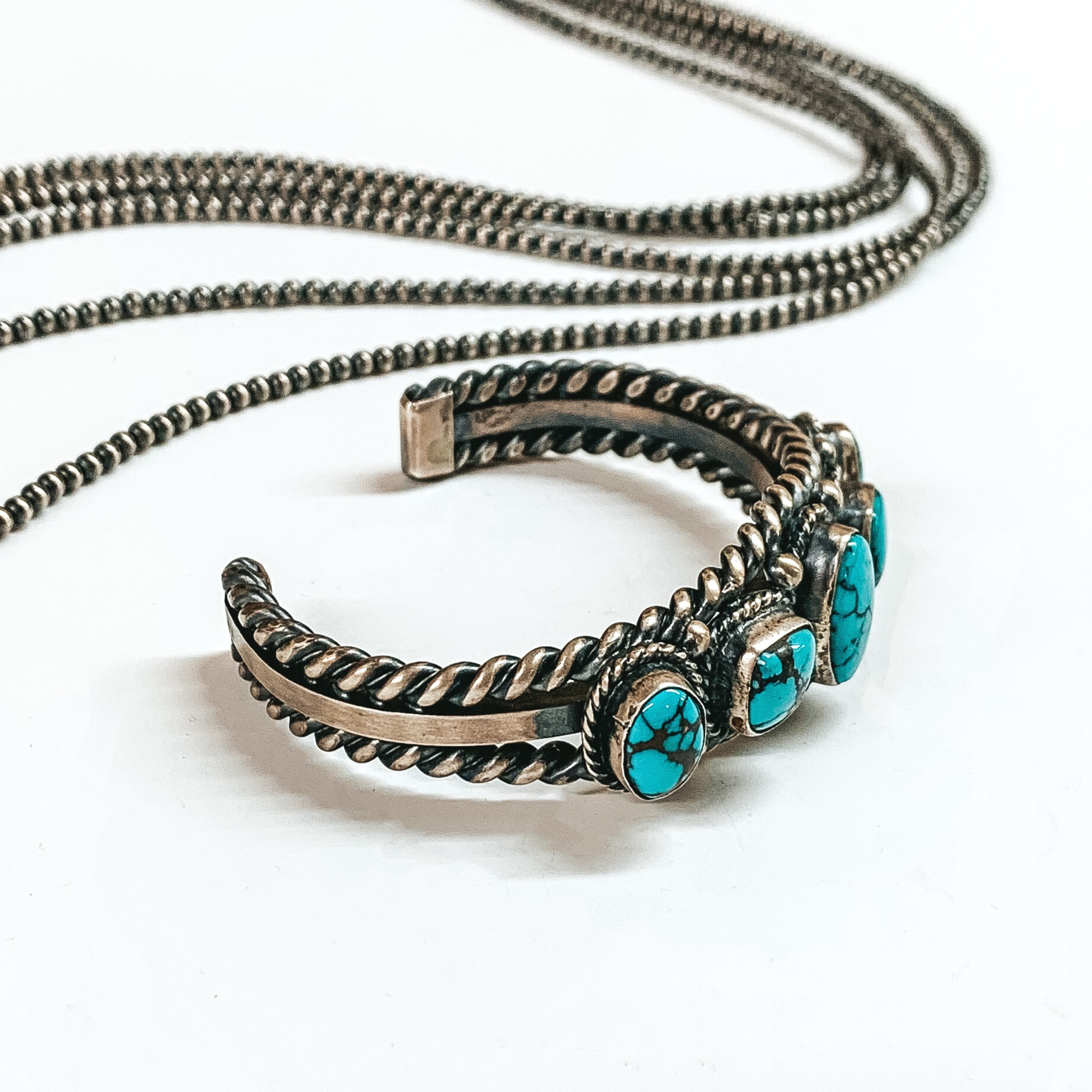 Tom Shirley | Navajo Handmade Sterling Silver Cuff with Five Turquoise Stones - Giddy Up Glamour Boutique