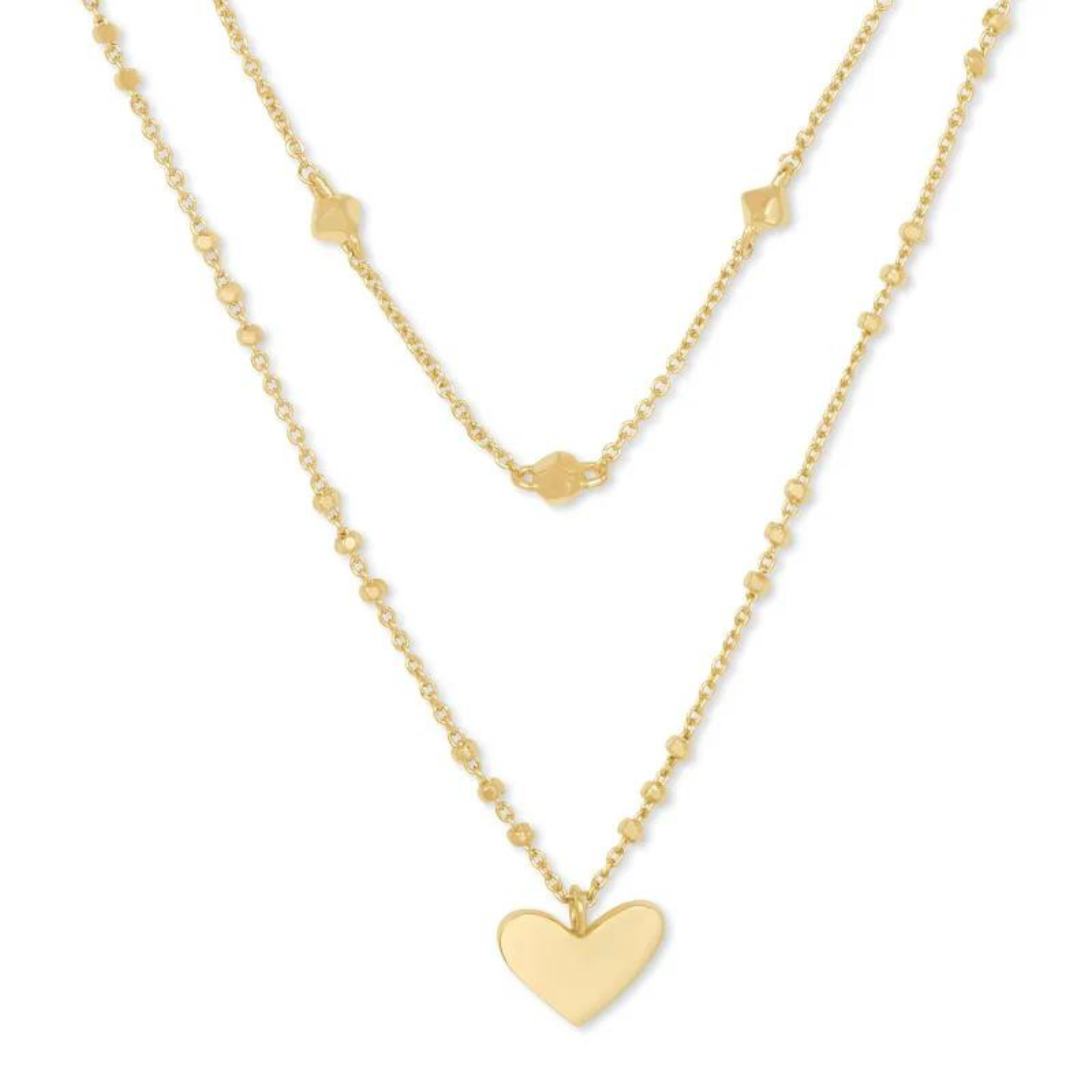 Multi strand gold heart neckalce pictured on a white background.