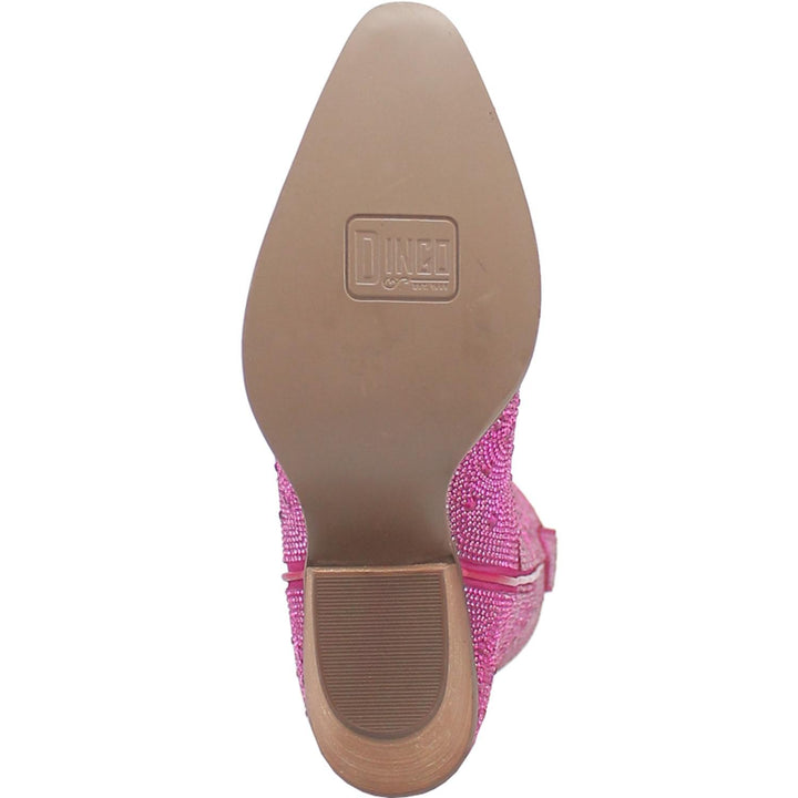 A mid calf length pink boot with rhinestones from top to bottom, matching leather straps, a short heel, and a V cut at the top. Item is pictured on a white background