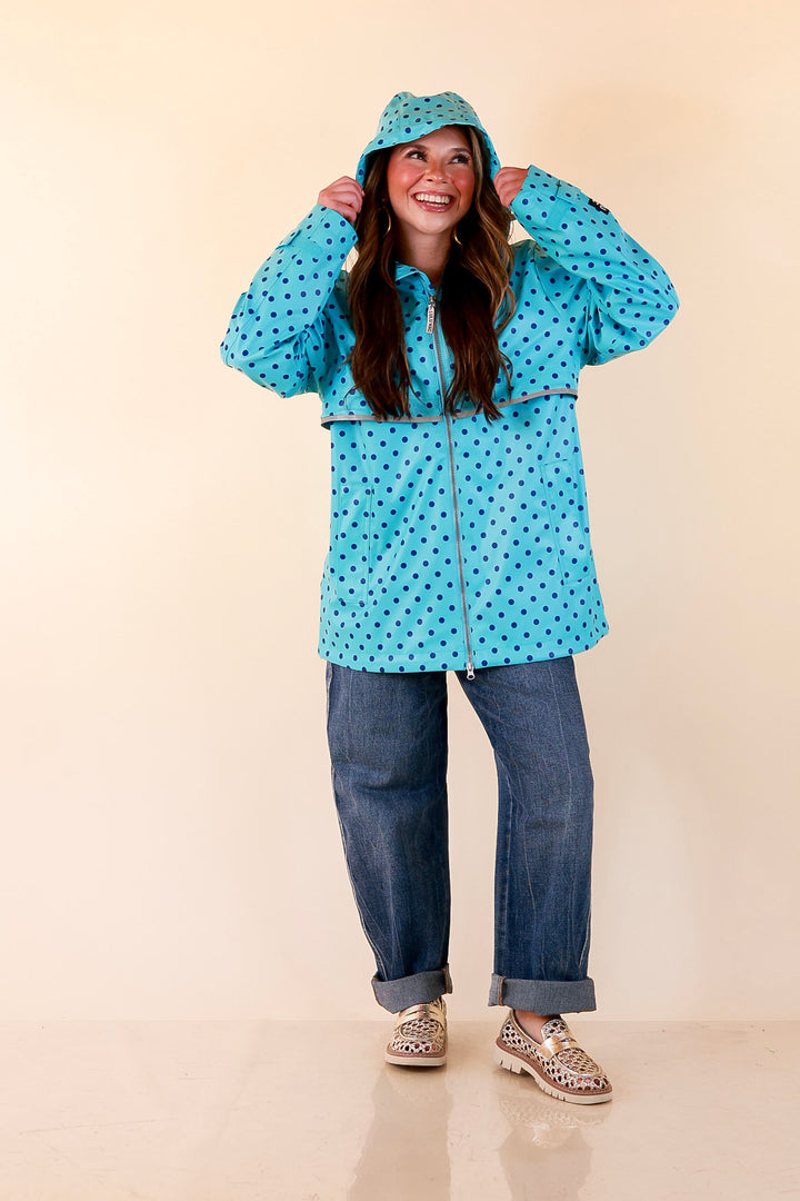 Lulu Mac | Chic Forecast Navy Blue Polka Dot Hooded Rain Jacket in Turquoise Blue
