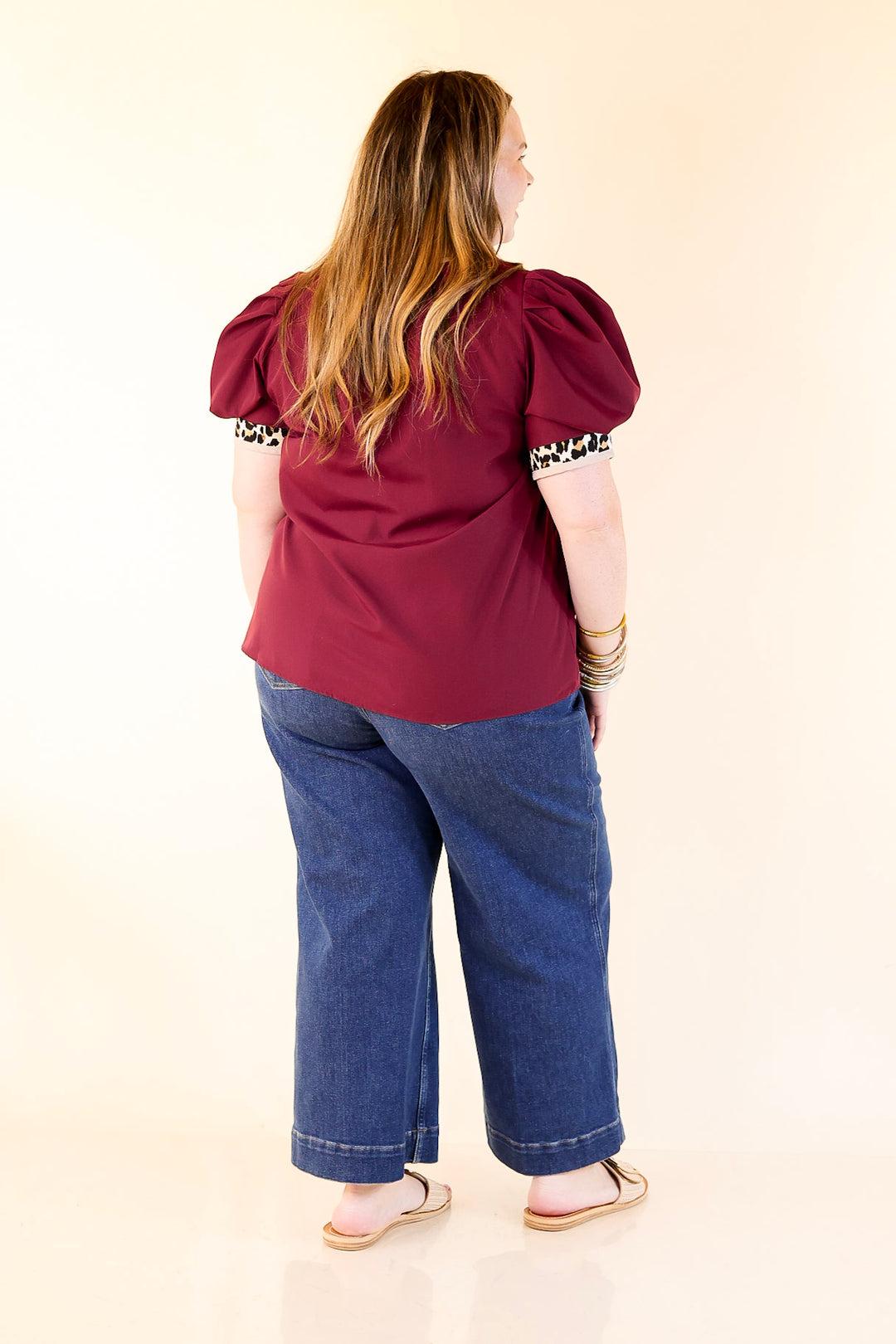 Standout Style V Neck Top with Short Balloon Sleeves and Leopard Print Trim in Maroon