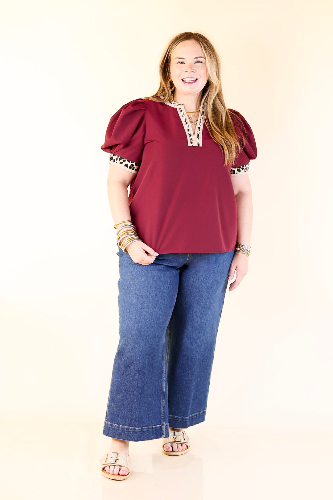 Standout Style V Neck Top with Short Balloon Sleeves and Leopard Print Trim in Maroon