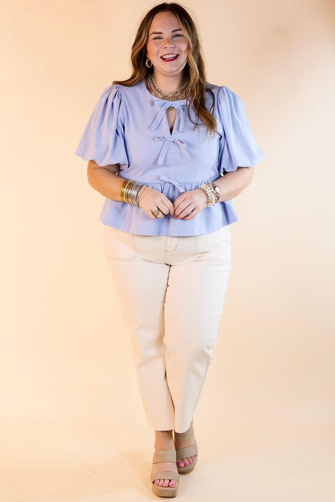 Simply Stunning Short Puff Sleeve Peplum Top with Bow Tie Detailing in Baby Blue