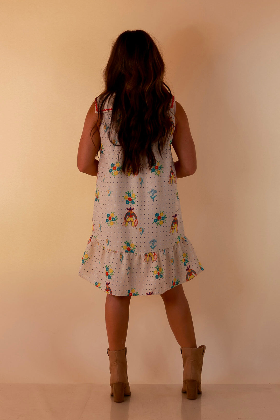 The Showstopper Sleeveless Pearl Snap Cowboy, Floral and Polka Dot Print Ruffle Dress with Sailor Collar and Cowboy Embroidery in Cream