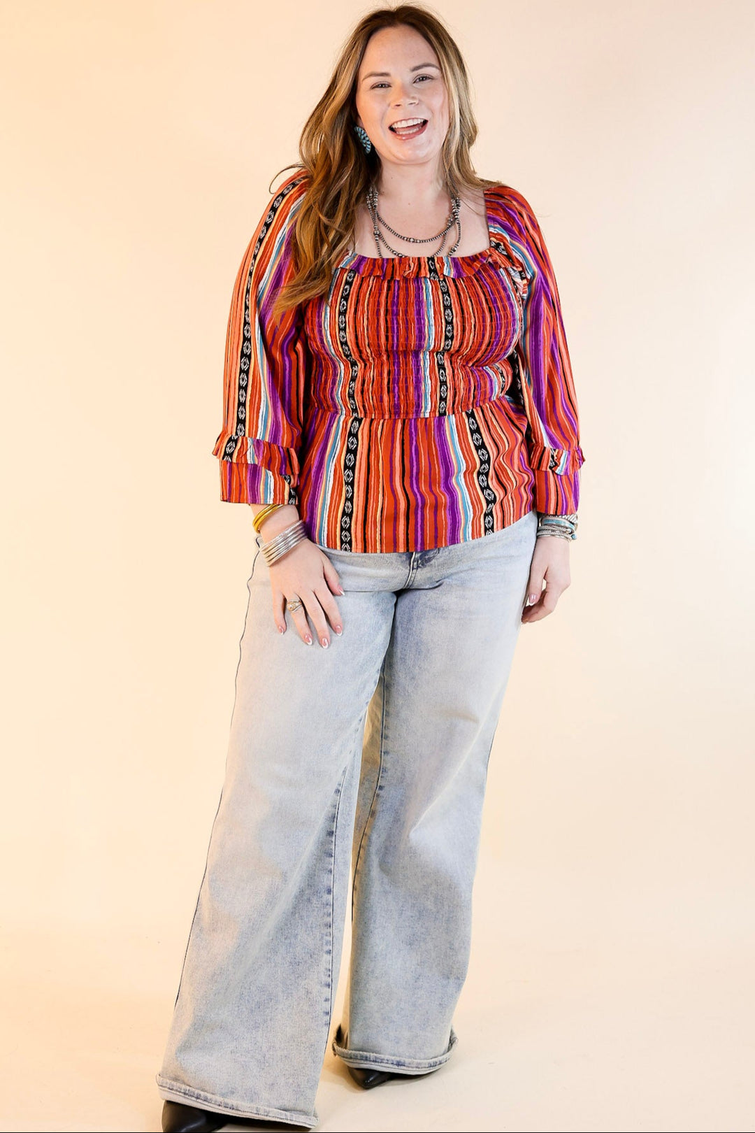 Blissful Break Serape Print Peplum Top with Smocked Bodice in Rust Orange Mix