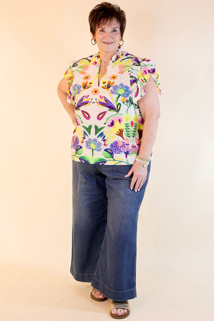 Island Escape Floral Print Top with Ruffle Cap Sleeves and Notched Neckline in Green Mix