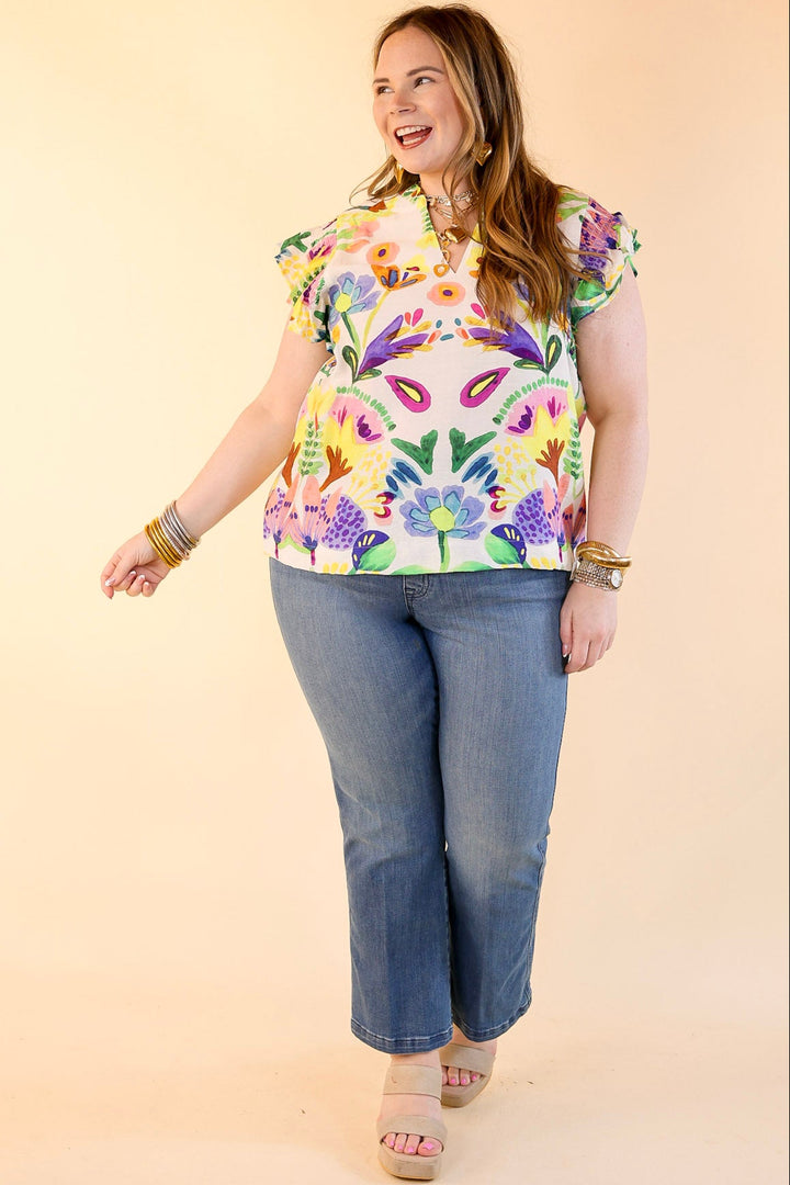 Island Escape Floral Print Top with Ruffle Cap Sleeves and Notched Neckline in Green Mix