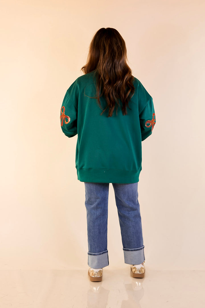 Wrapped in Style Crewneck Sweatshirt with Sequin Red Bows in Dark Green