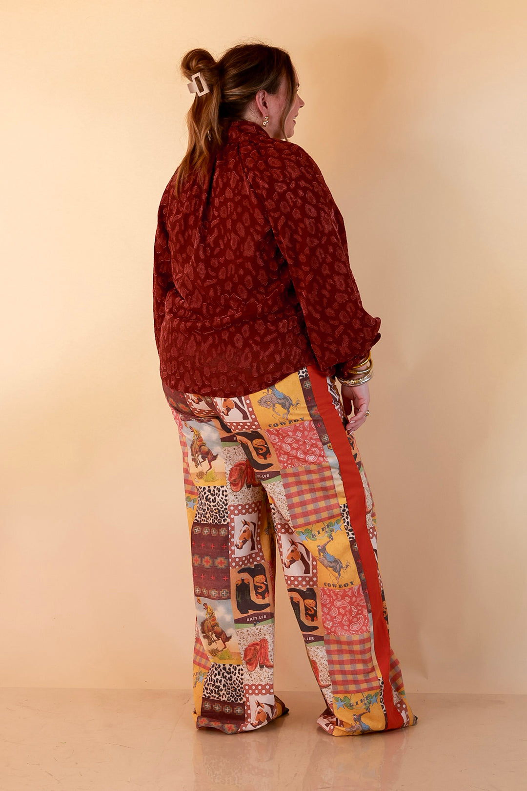 Commanding Attention Tie Neck Velvet Animal Print Balloon Sleeve Blouse in Burgundy