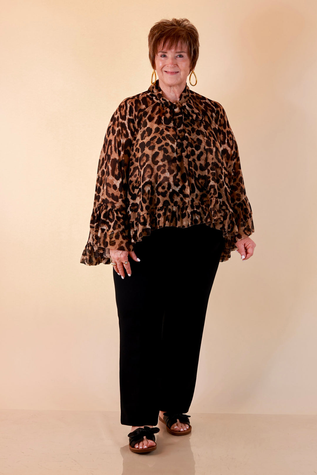 Flirt Factor Long Sleeve Sheer Blouse with Bell Sleeves and Ruffle Detailing and Tie Collar in Leopard Print